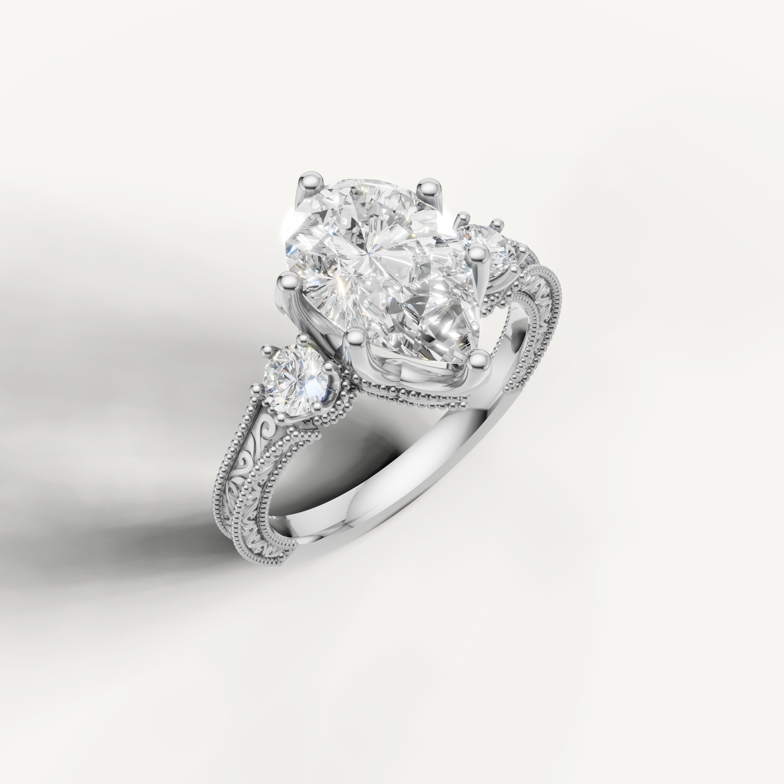 White Gold Pear Diamond Engagement Ring with Floral Engraved Band – Raul Diamonds