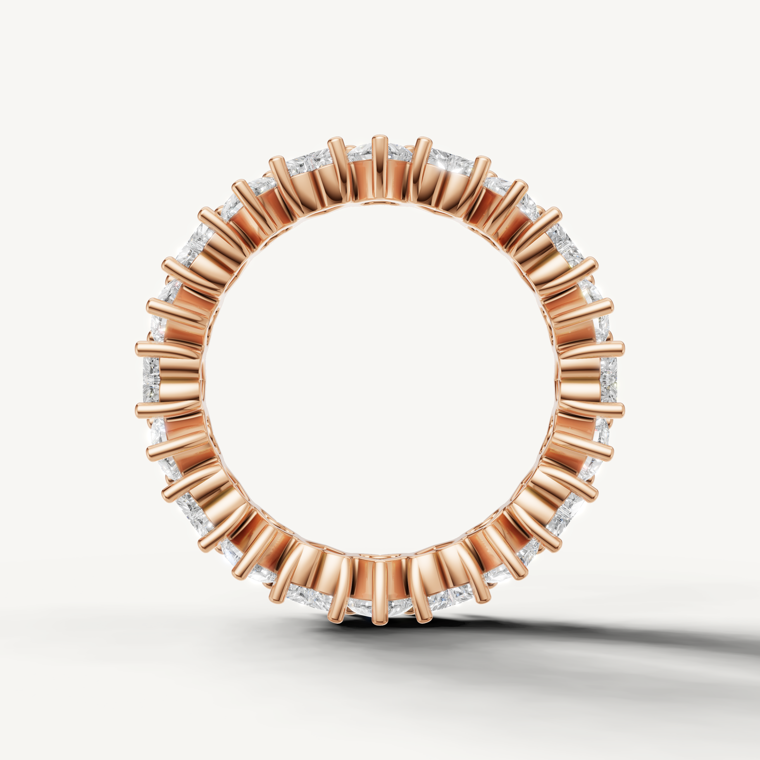 IGI certified heart shaped diamond eternity band in polished rose gold