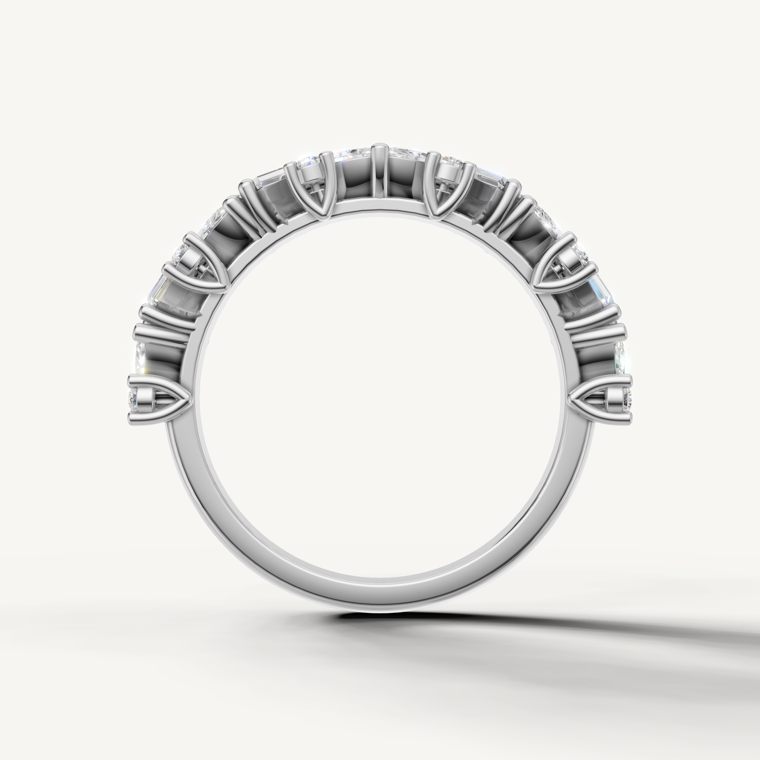 Designer white gold wedding band with alternating marquise and baguette cut diamonds