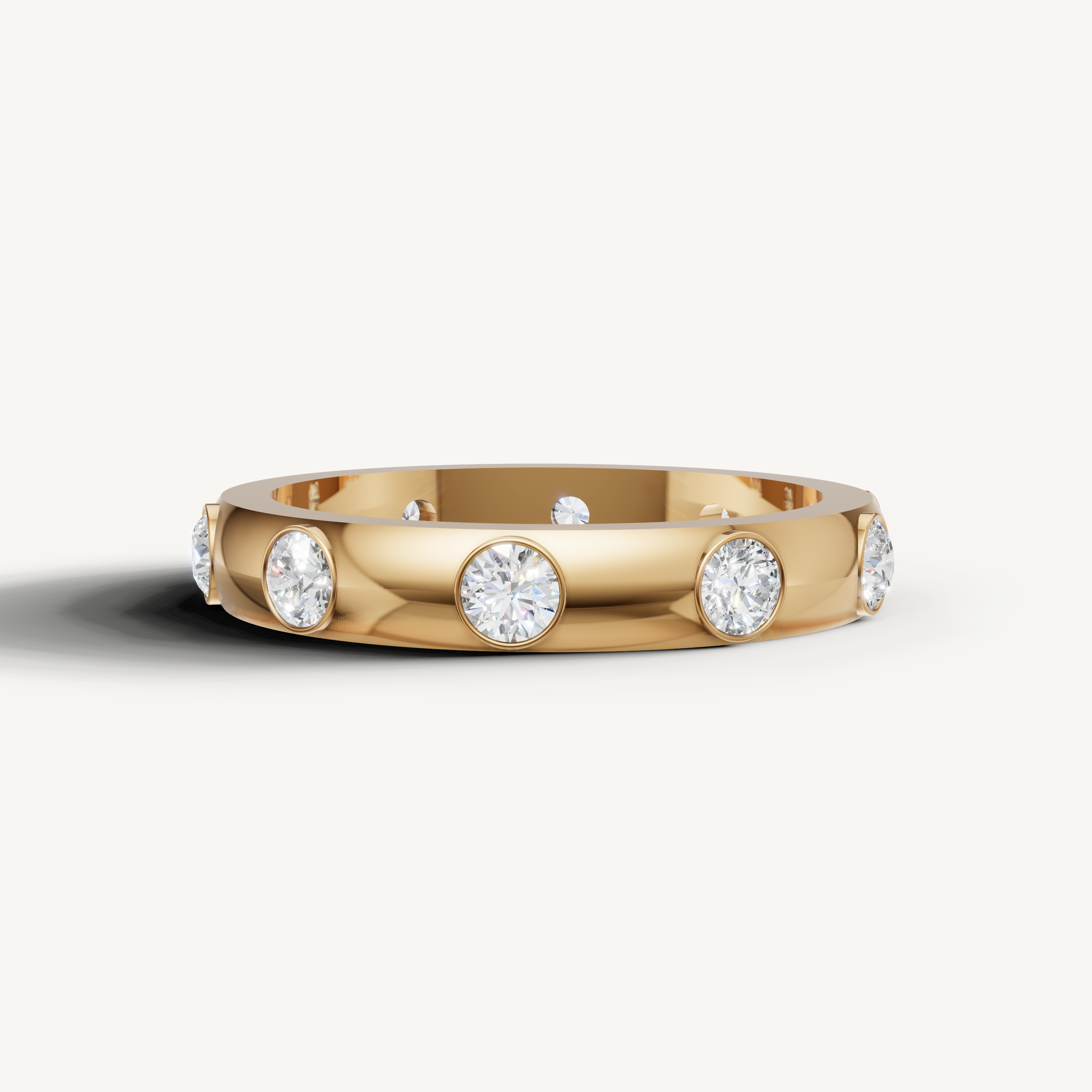 bezel set round lab grown diamond eternity band in 14k yellow gold