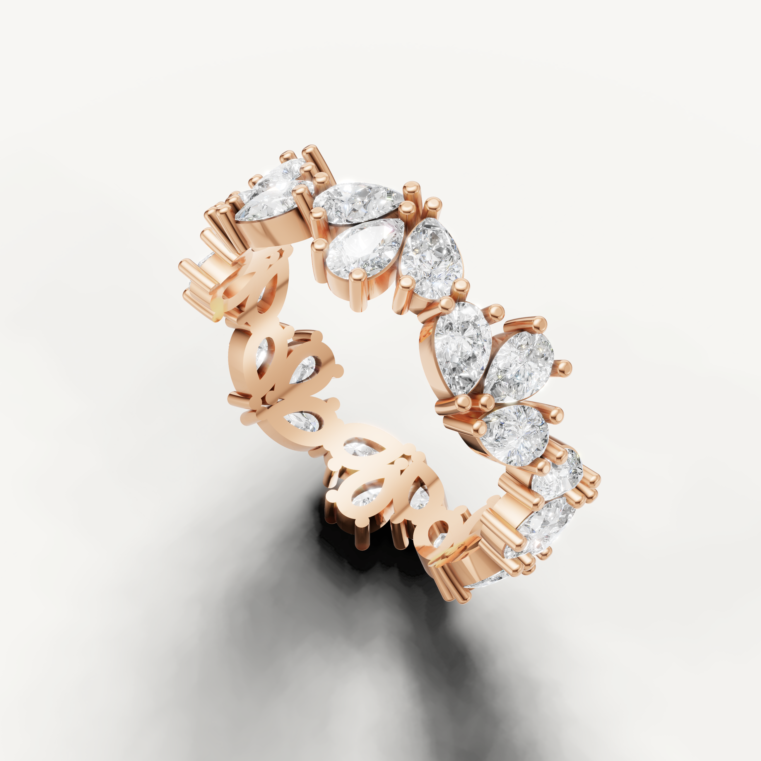 elegant shared prong pear cut anniversary ring in rose gold