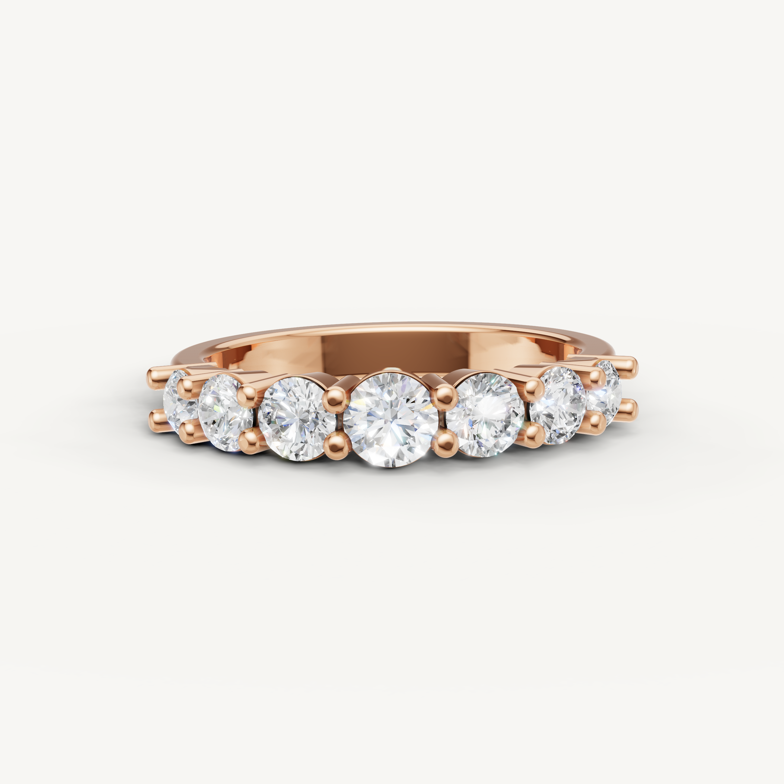 Raul Diamonds rose gold wedding band with graduated round lab grown diamonds and shared prong setting