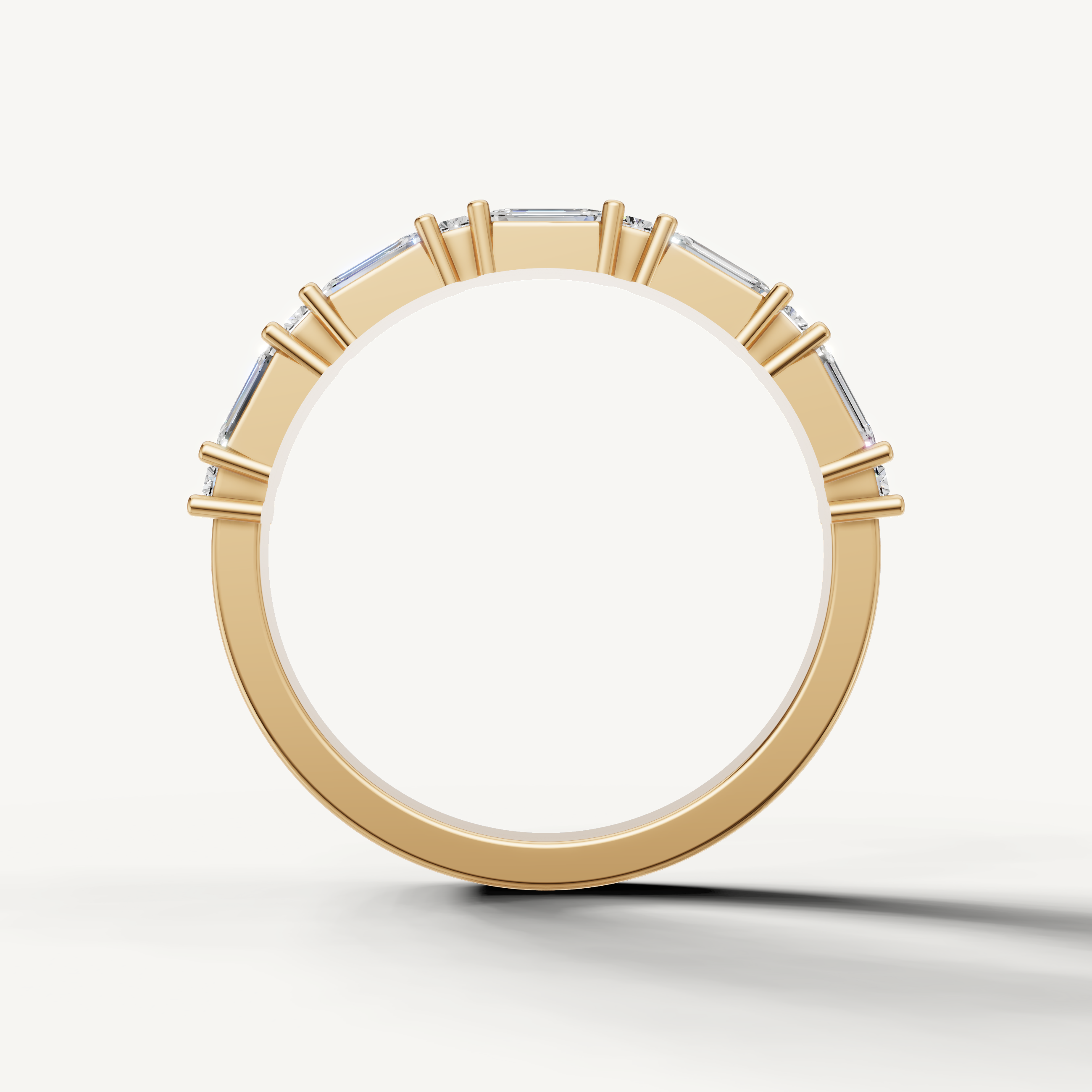 Elegant yellow gold diamond wedding ring with emerald cut lab grown stones crafted by Raul Diamonds