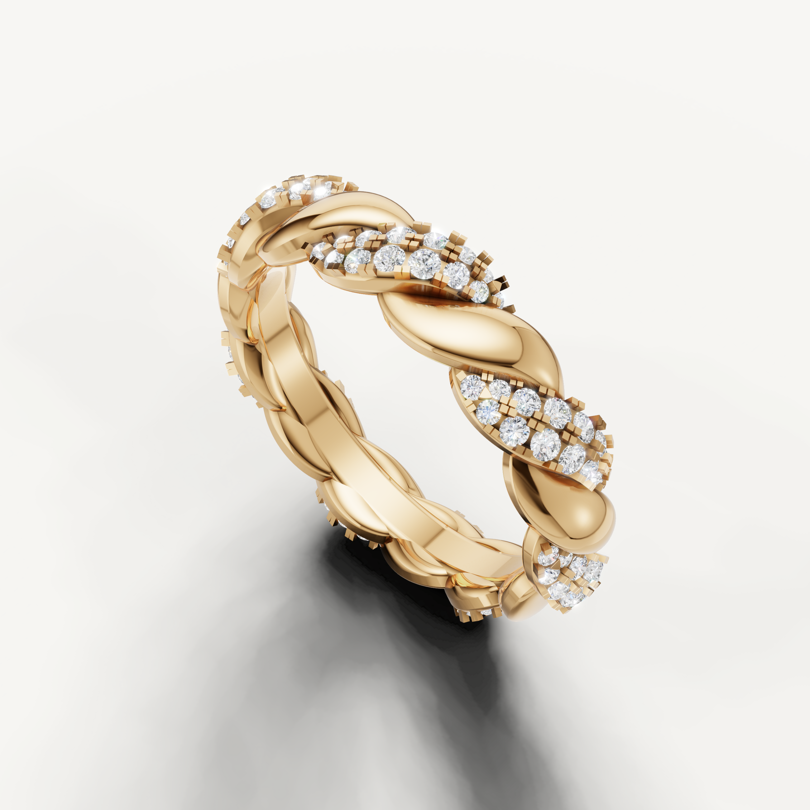 Luxury yellow gold eternity wedding band with sparkling round diamonds and woven braid detailing by Raul Diamonds