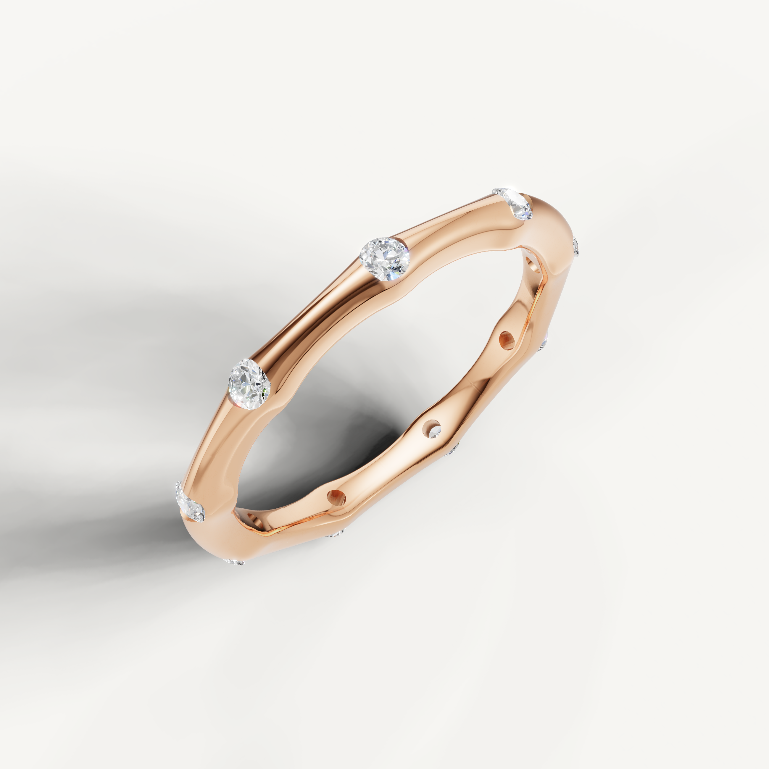 Rose gold floating diamond wedding ring featuring modern minimalist craftsmanship by Raul Diamonds