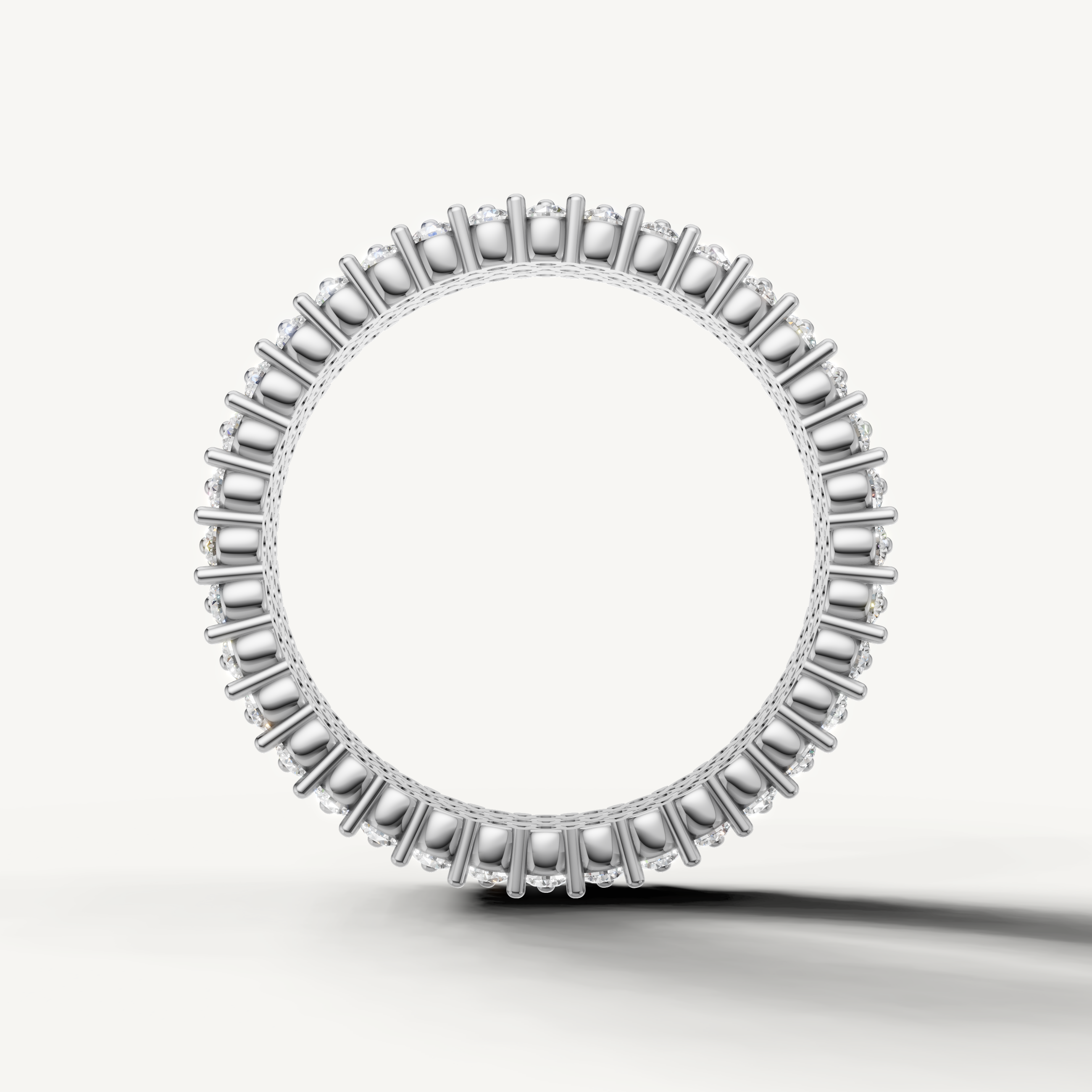 Modern white gold diamond wedding band with layered pavé detailing and premium craftsmanship by Raul Diamonds