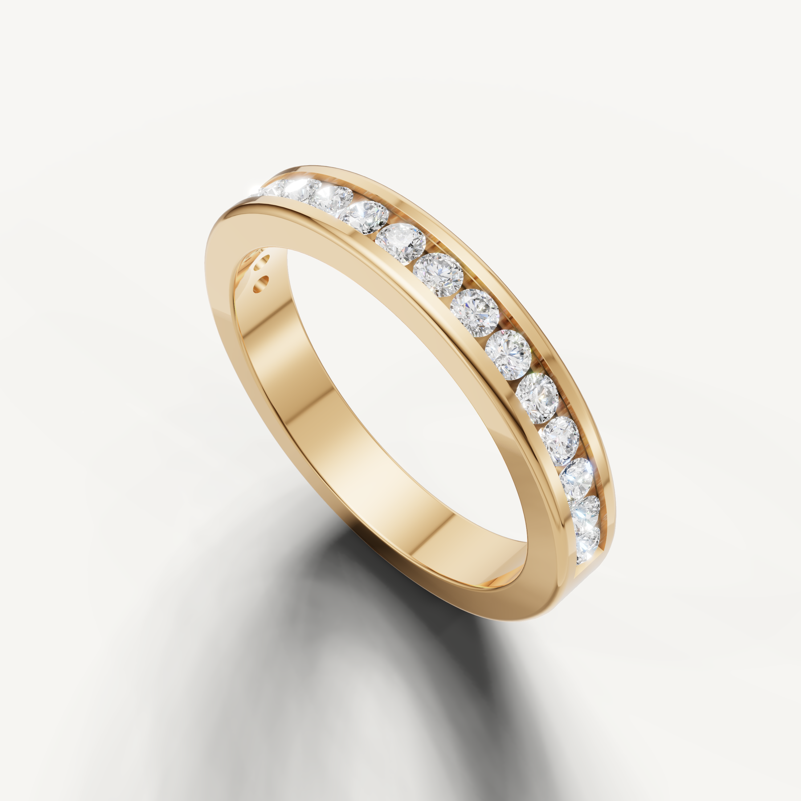 Luxury yellow gold diamond anniversary band with sleek channel setting from Raul Diamonds