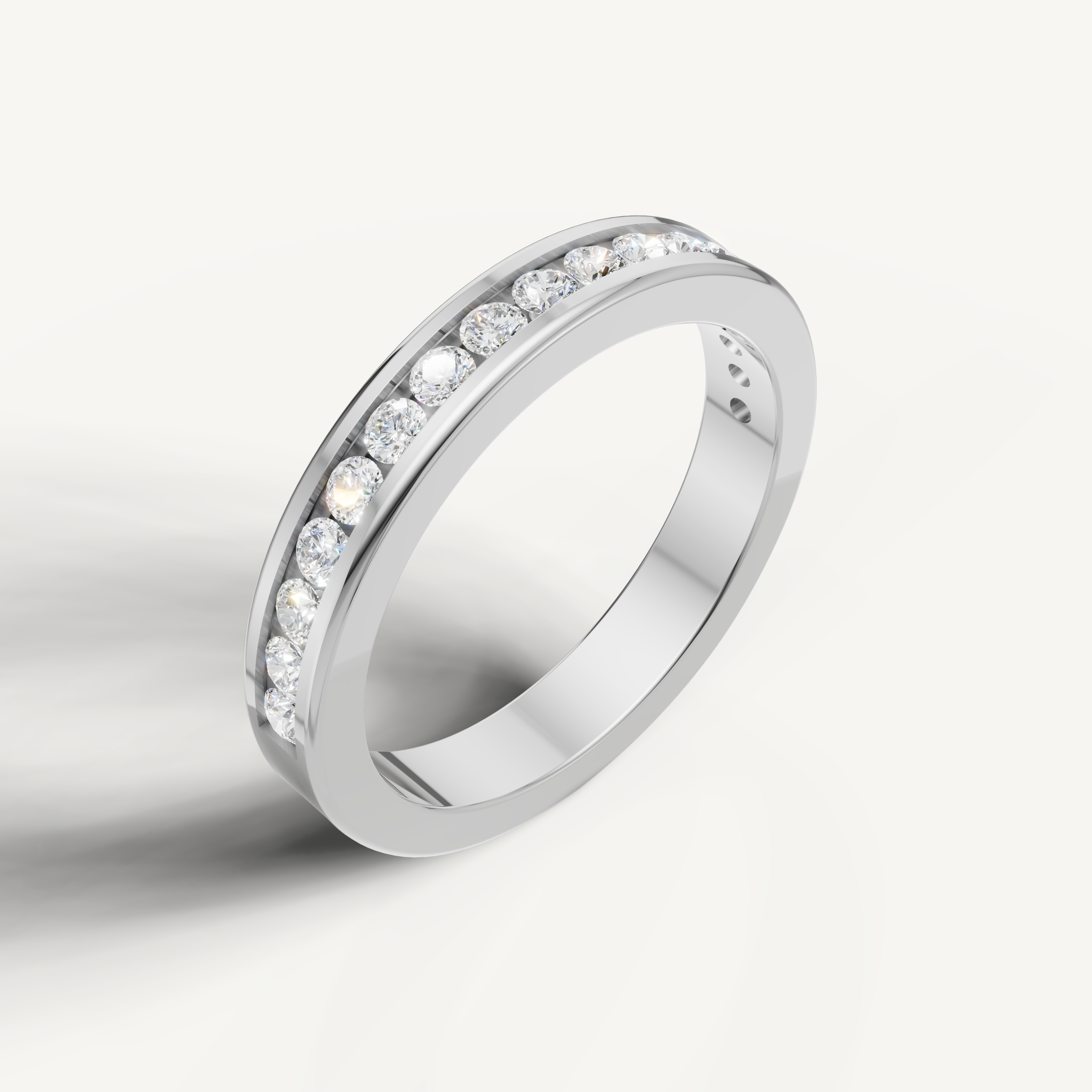 Elegant white gold eternity style ring by Raul Diamonds with sparkling round diamonds