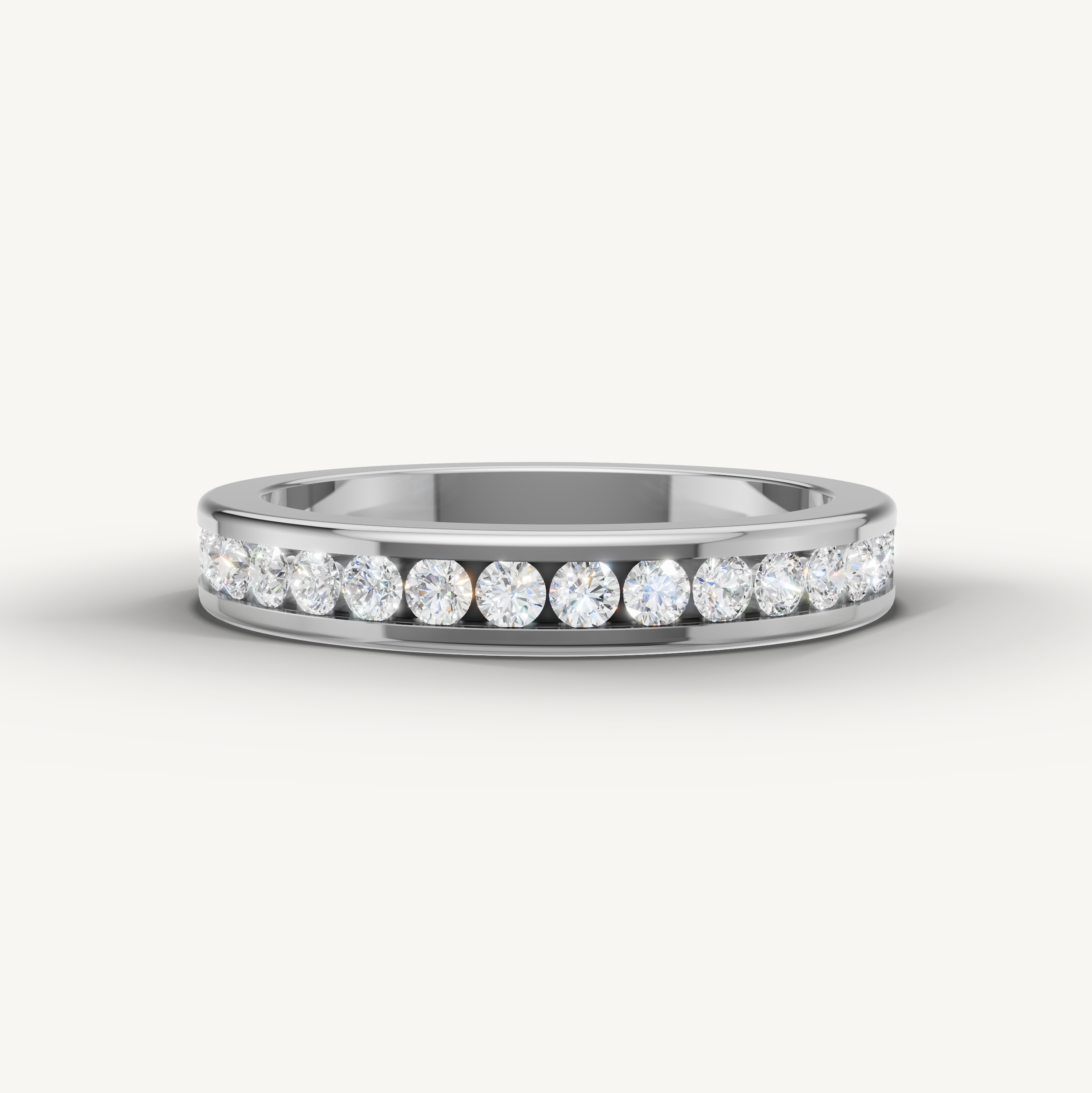 Round lab grown diamond channel set wedding band in 14K white gold by Raul Diamonds