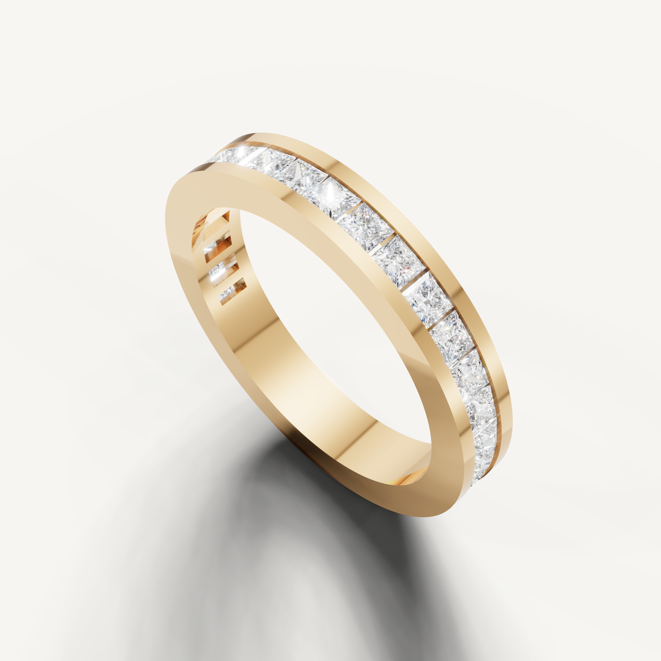 Luxury yellow gold princess diamond anniversary band with modern channel design from Raul Diamonds