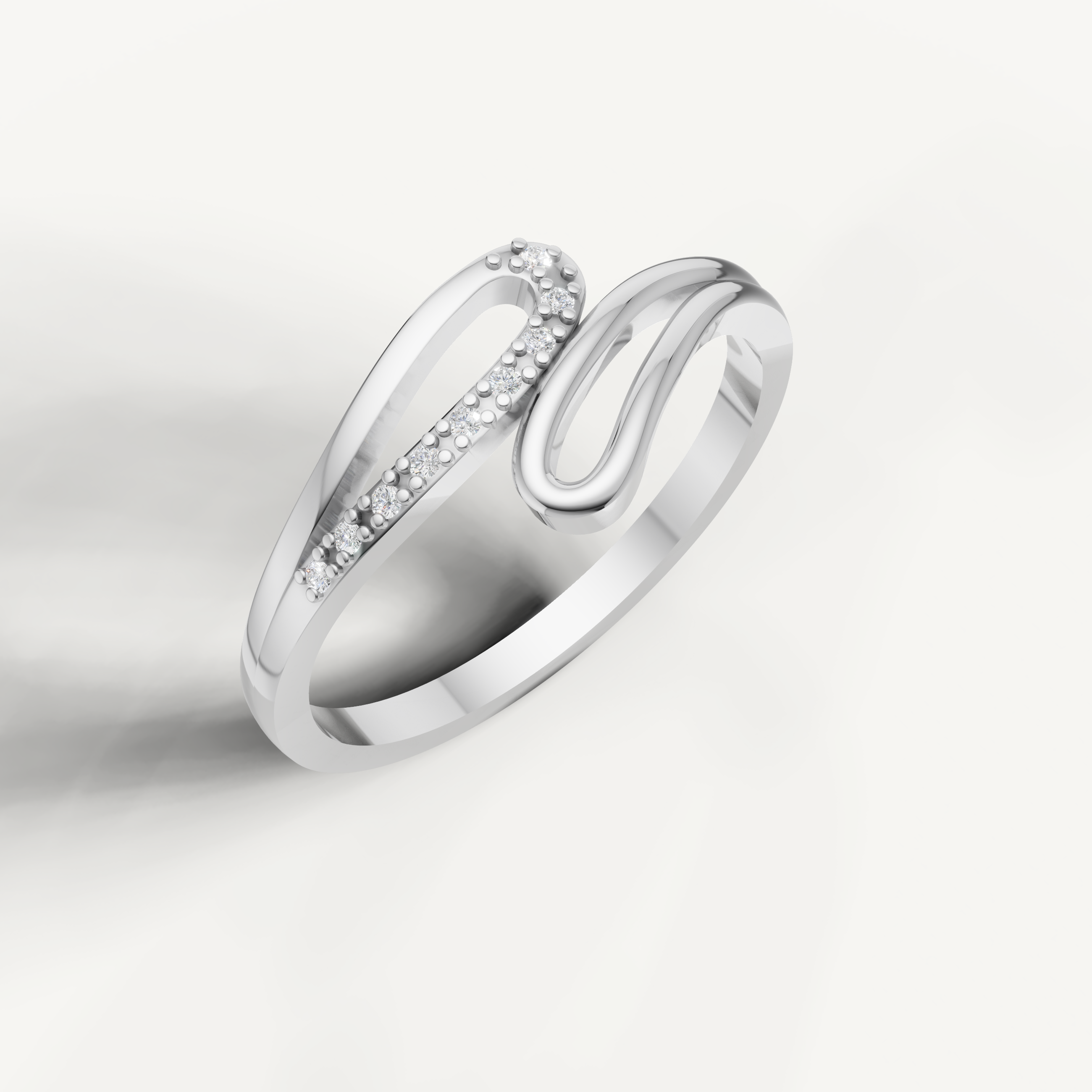 Elegant white gold contemporary ring by Raul Diamonds with pavé round diamonds