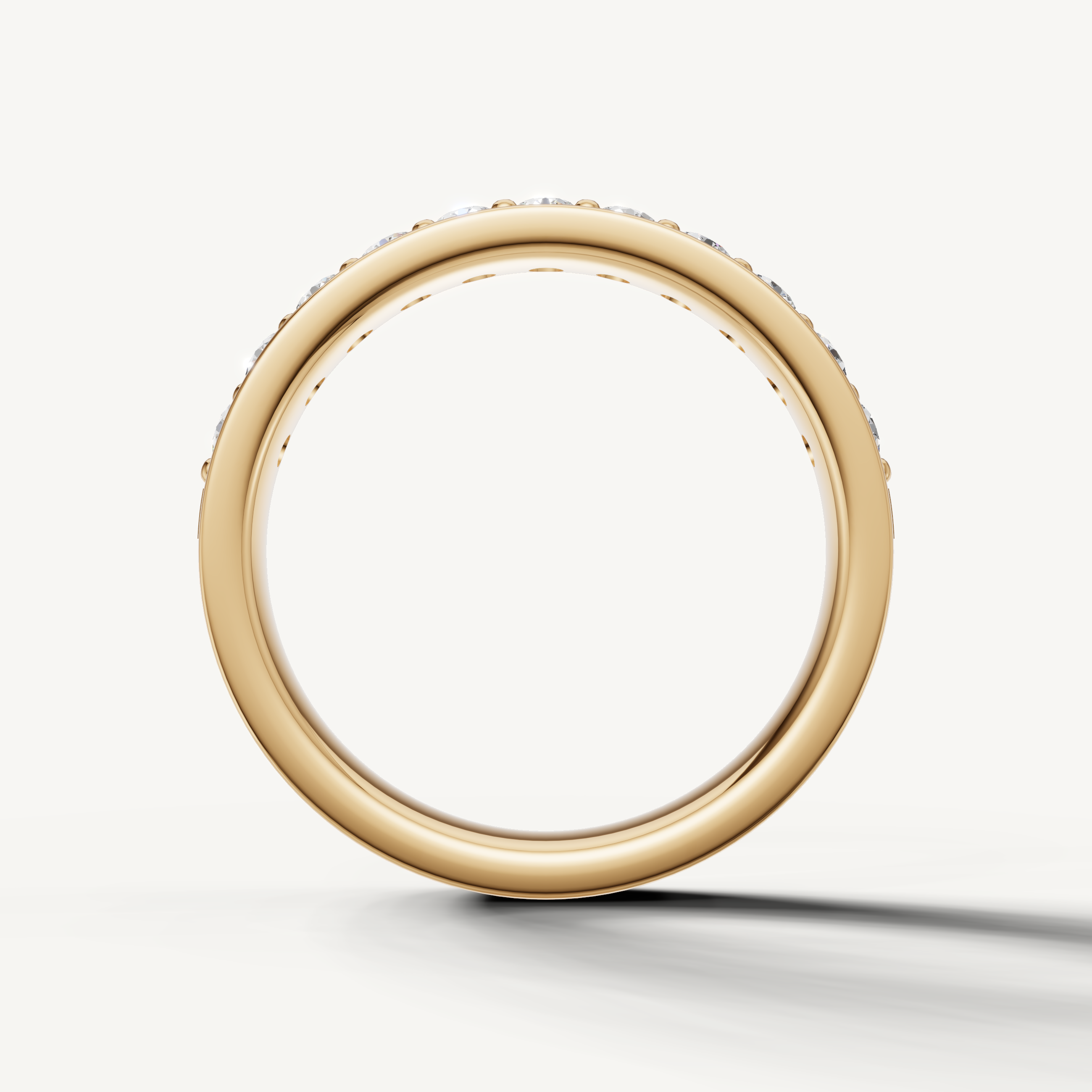 Classic yellow gold diamond wedding ring with shared prong round diamonds