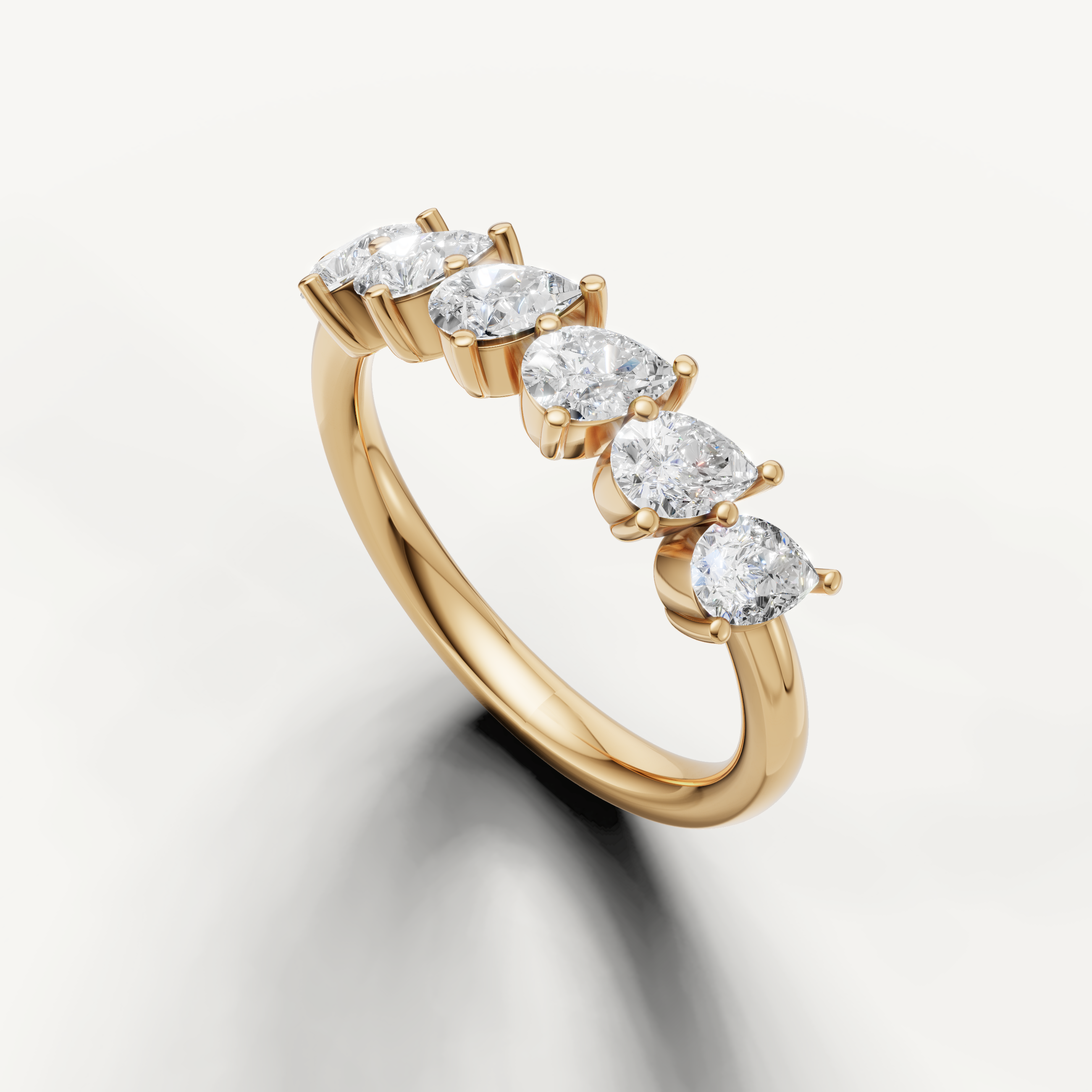 Elegant yellow gold wedding ring with pear cut diamonds for women Raul Diamonds