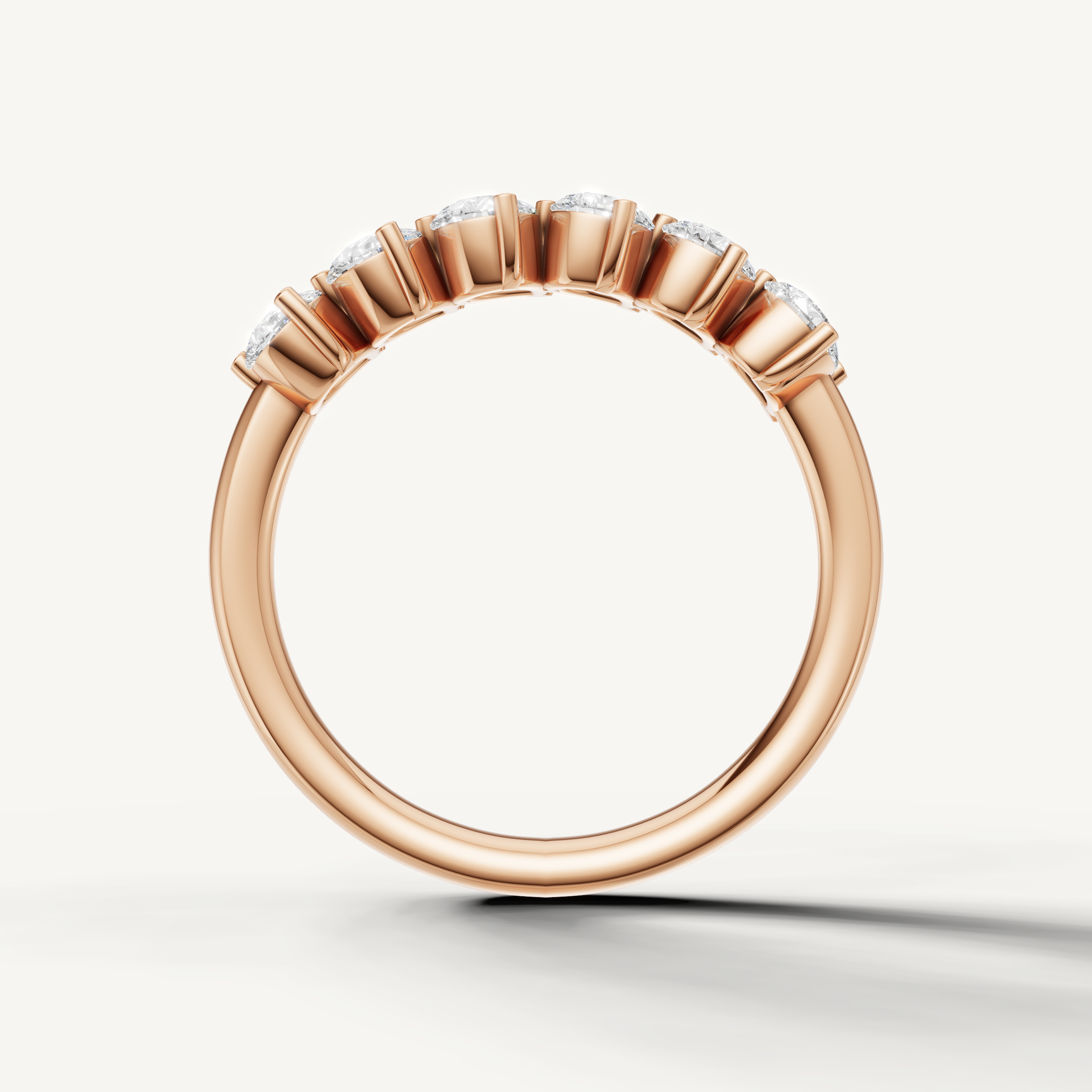 Elegant rose gold anniversary wedding ring with sparkling pear diamonds