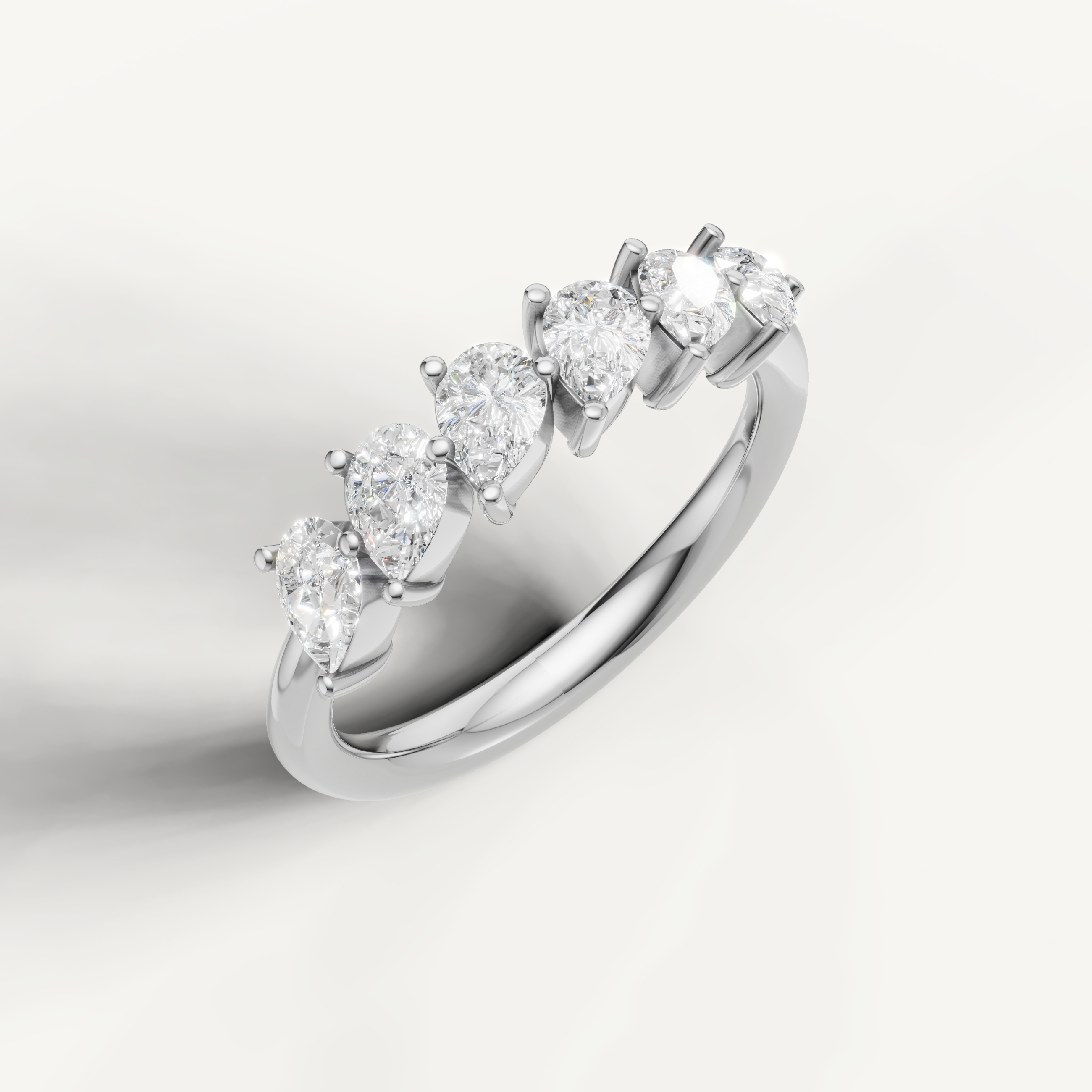 Luxury white gold pear shaped diamond eternity wedding ring Raul Diamonds