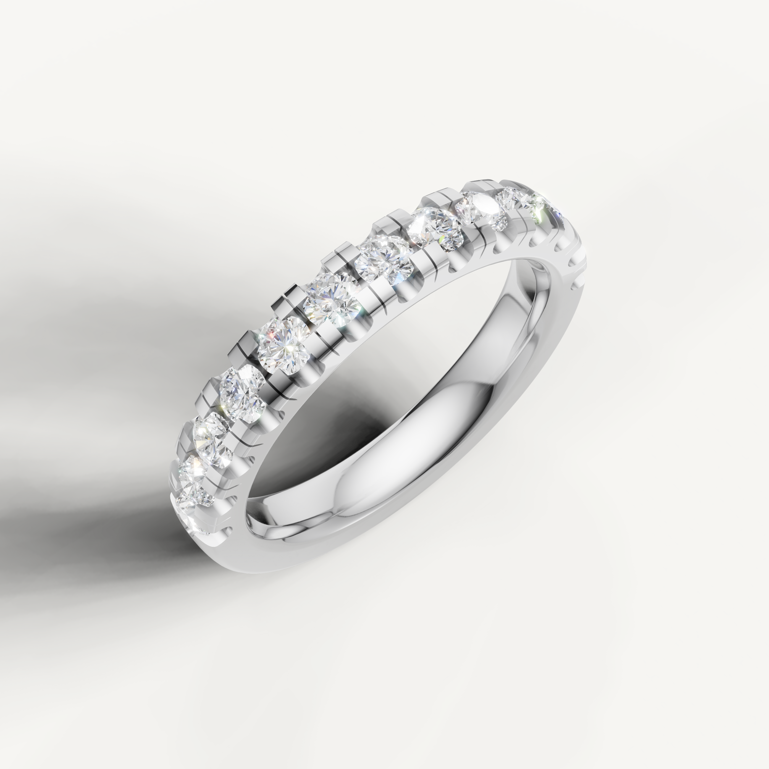 Modern white gold diamond wedding band with brilliant round cut diamonds by Raul Diamonds
