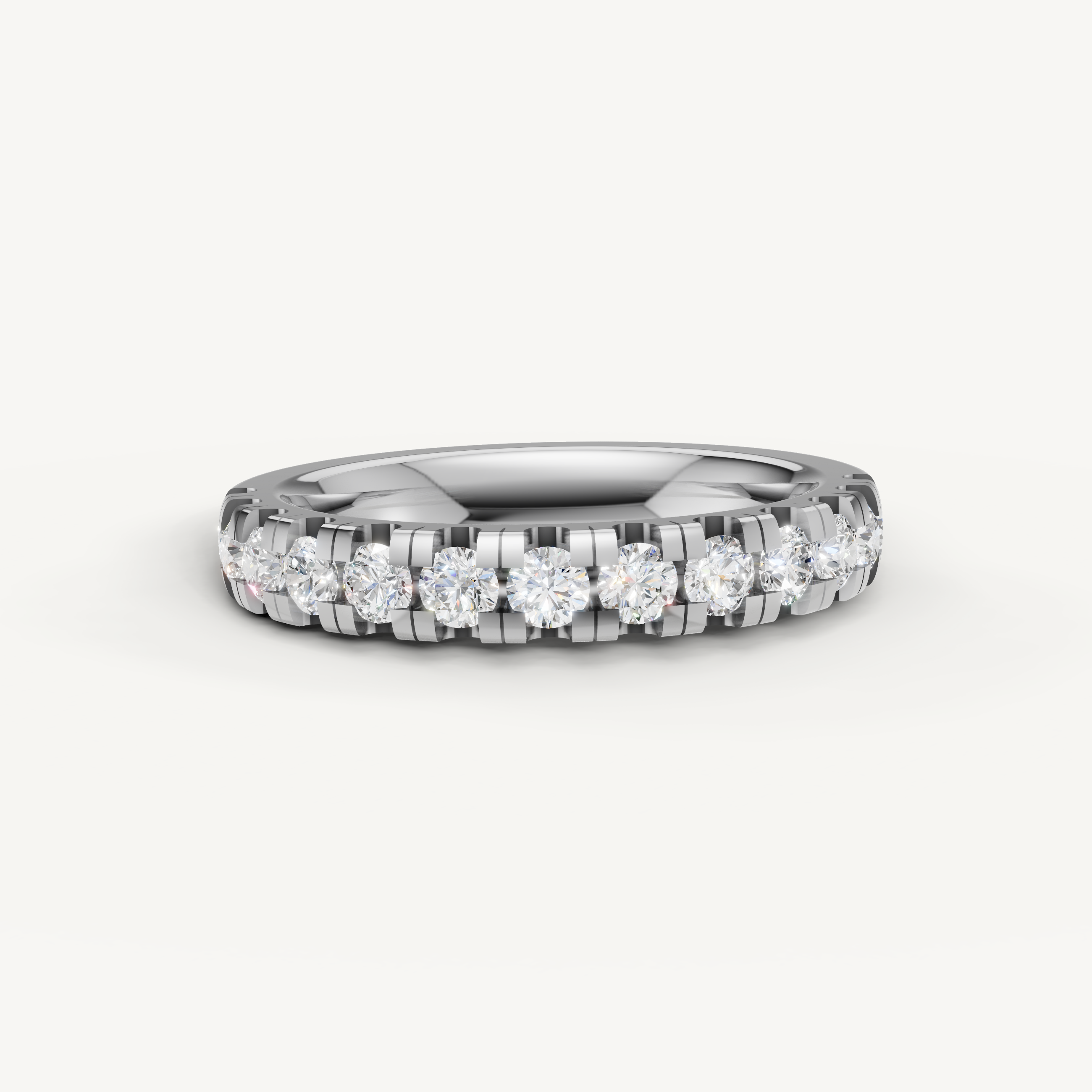 Raul Diamonds white gold round diamond eternity wedding band with shared prong setting