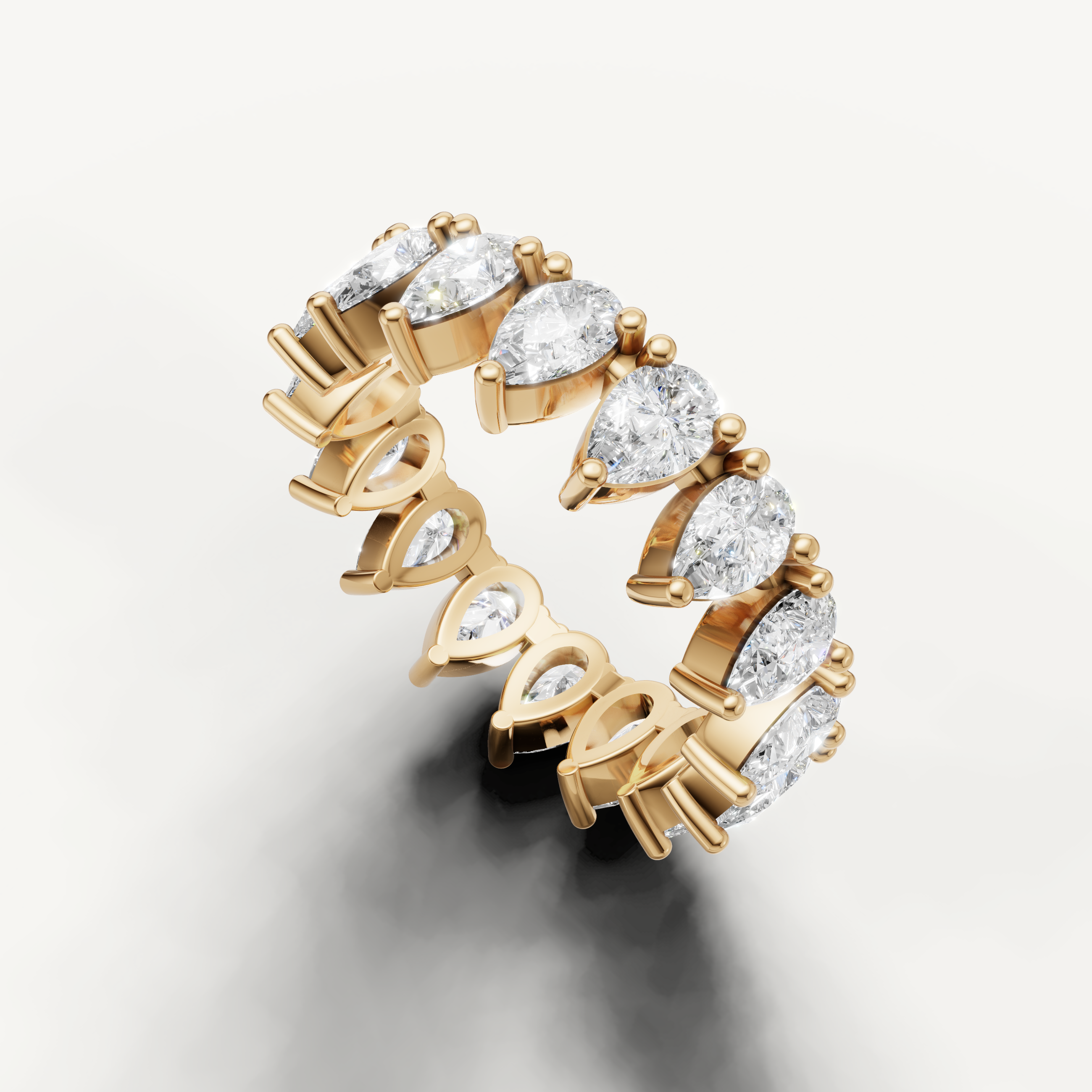 Luxury yellow gold pear diamond anniversary wedding ring with brilliant sparkle