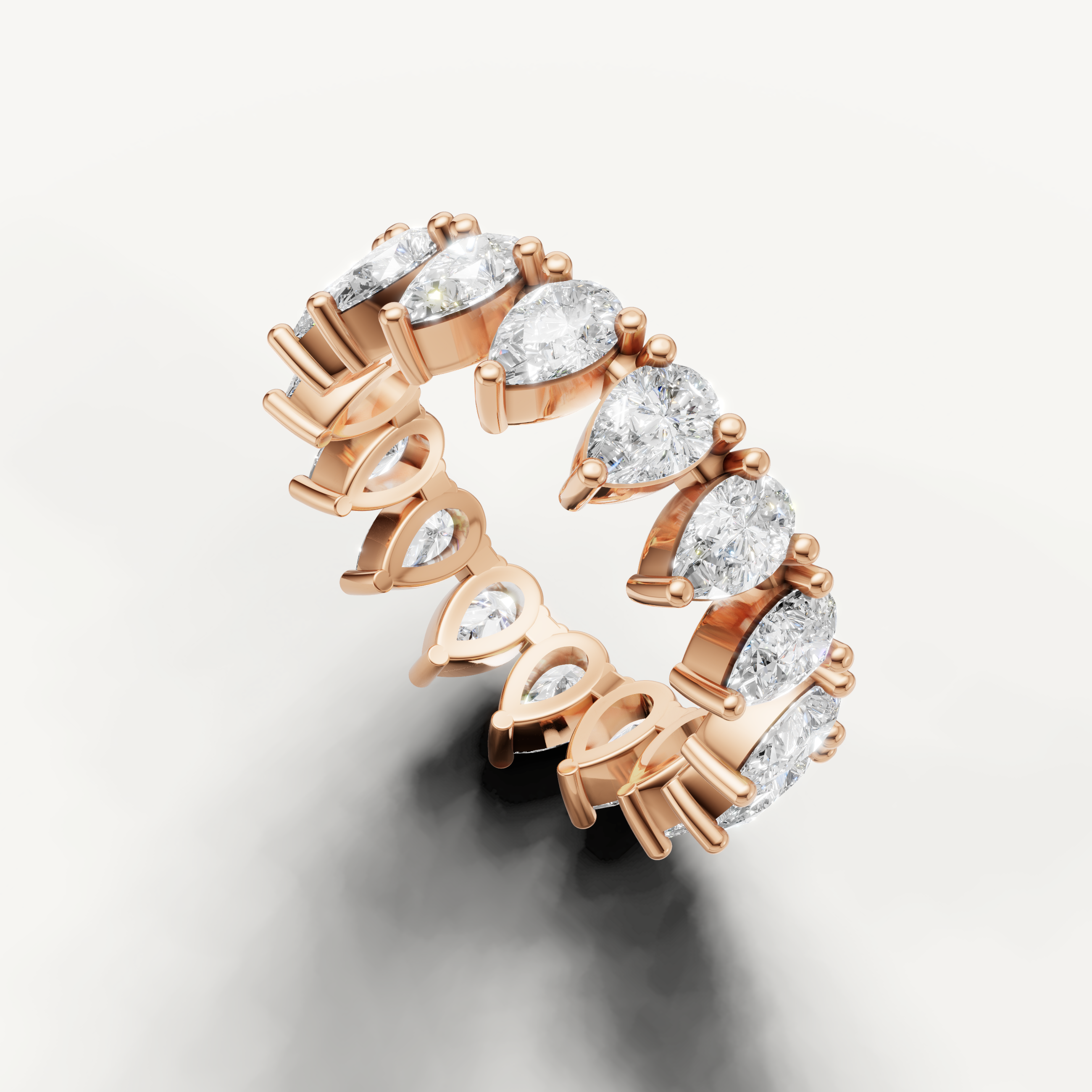 Luxury rose gold pear diamond anniversary band with sparkling diamonds from Raul Diamonds