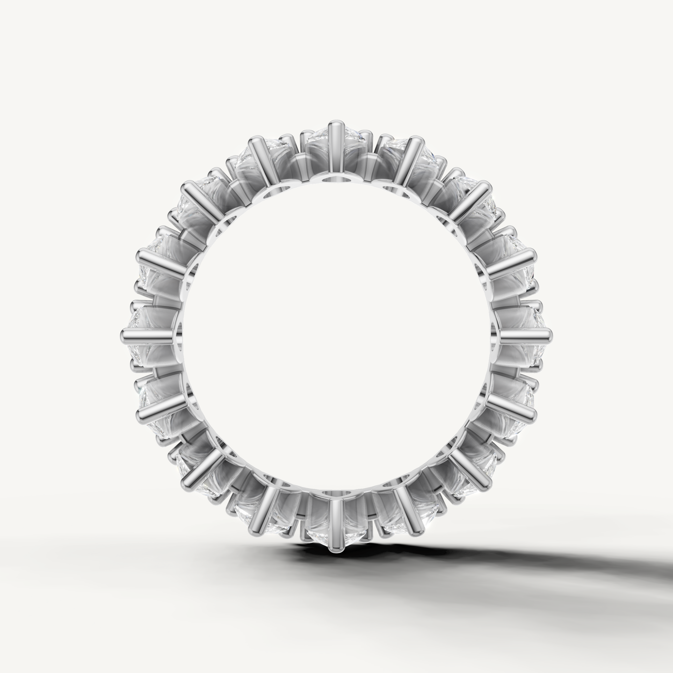 Luxury white gold eternity diamond band with pear shaped diamonds from Raul Diamonds
