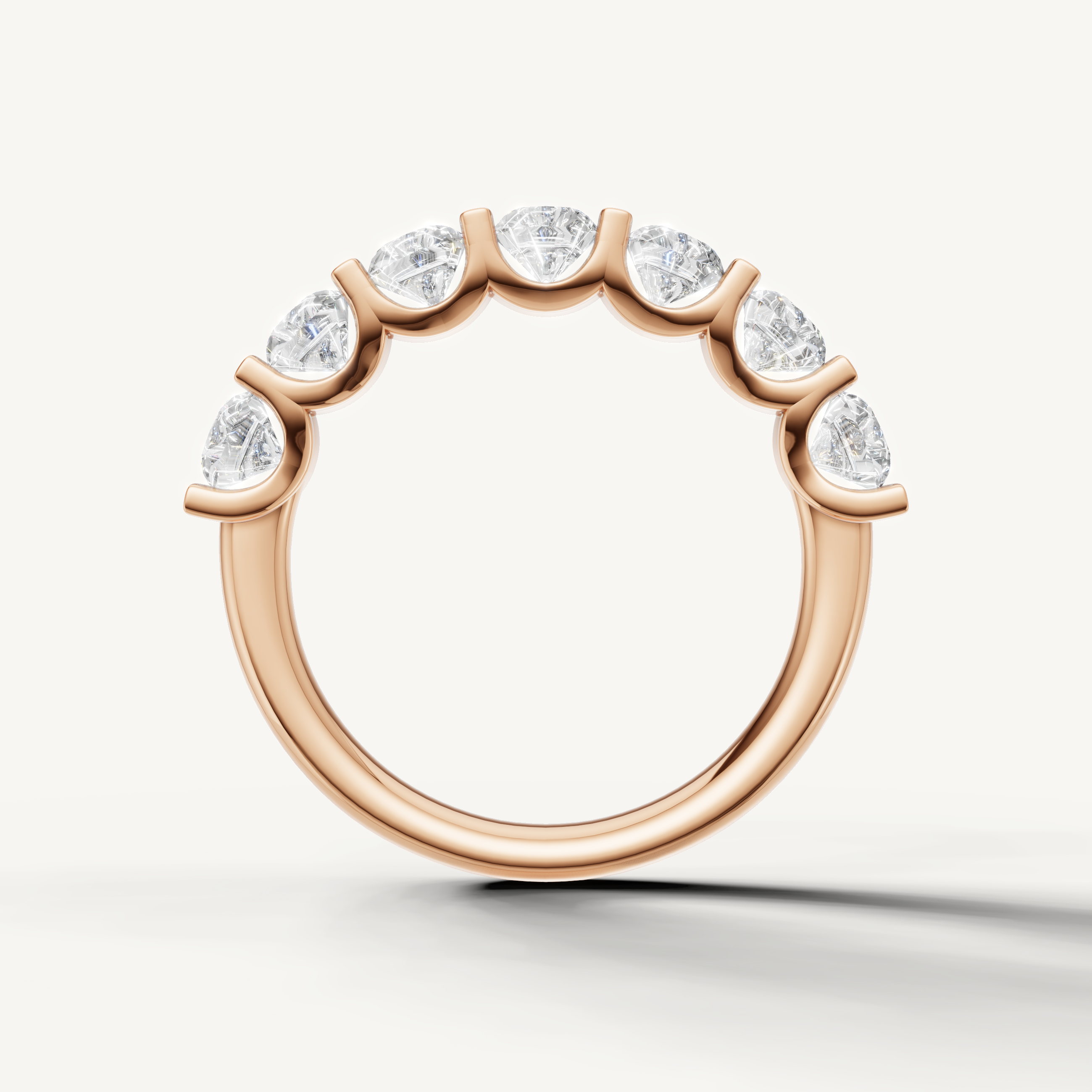 Rose gold eternity wedding band with round brilliant diamonds