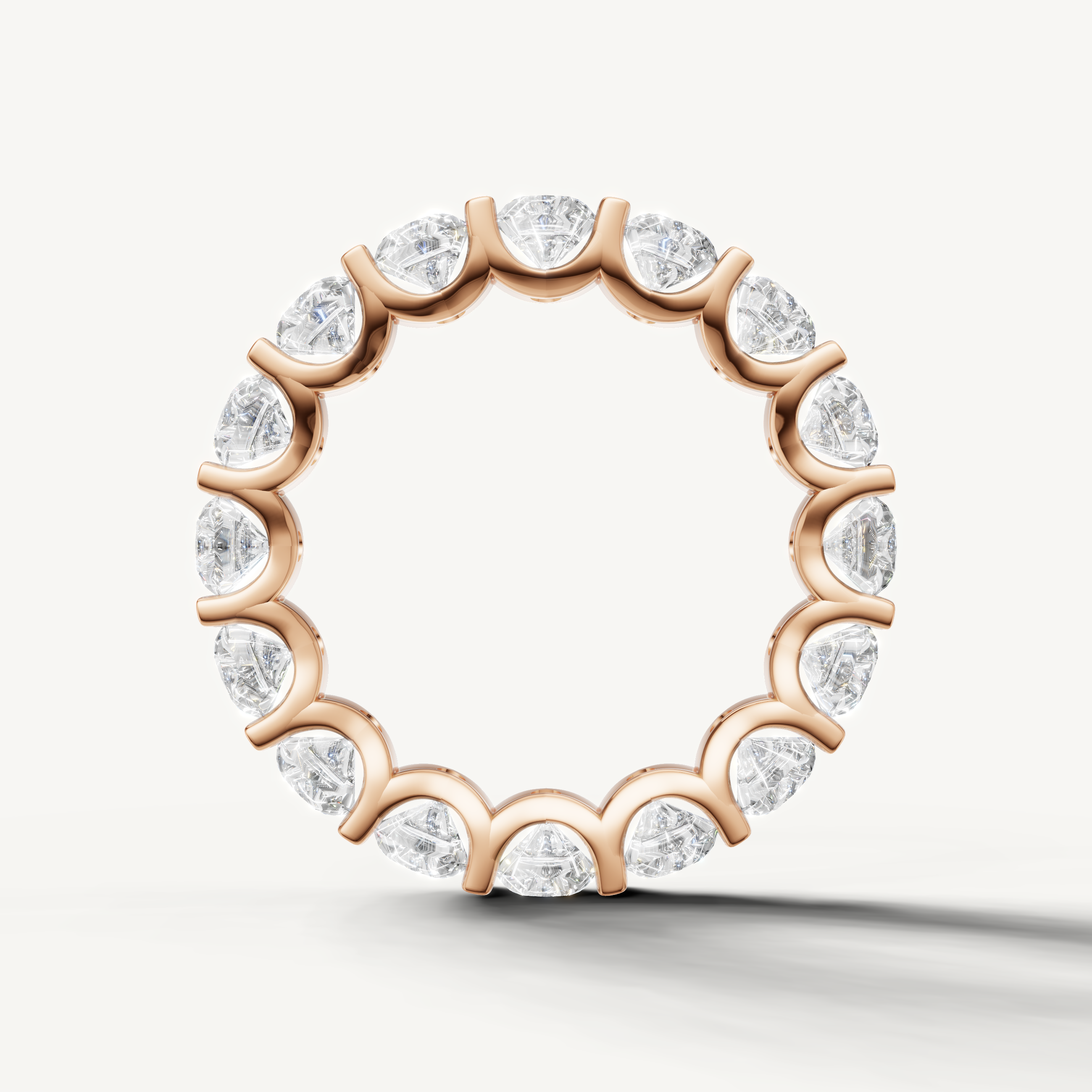 Modern rose gold wedding band with round brilliant diamonds