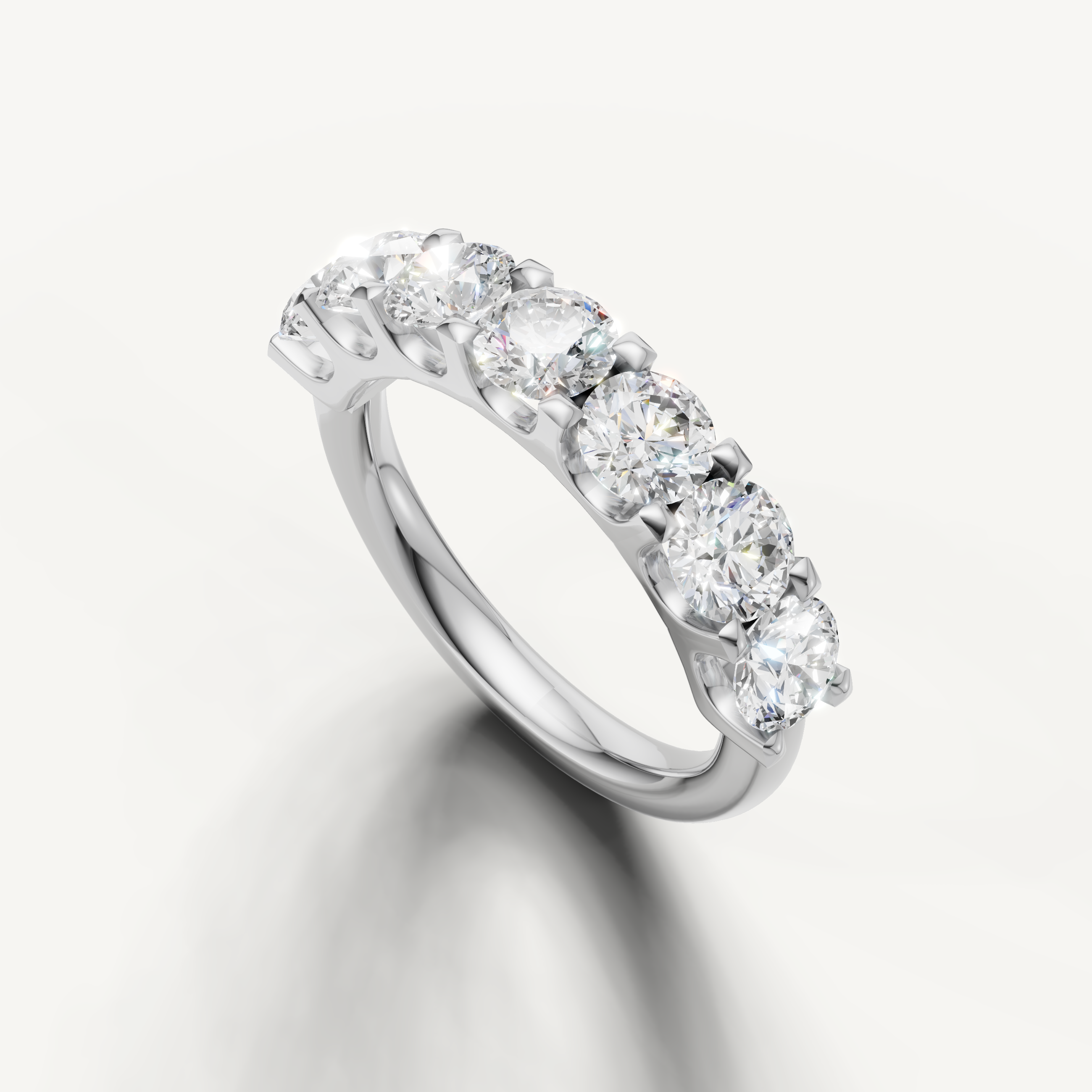 Premium white gold shared prong diamond eternity band Raul Diamonds