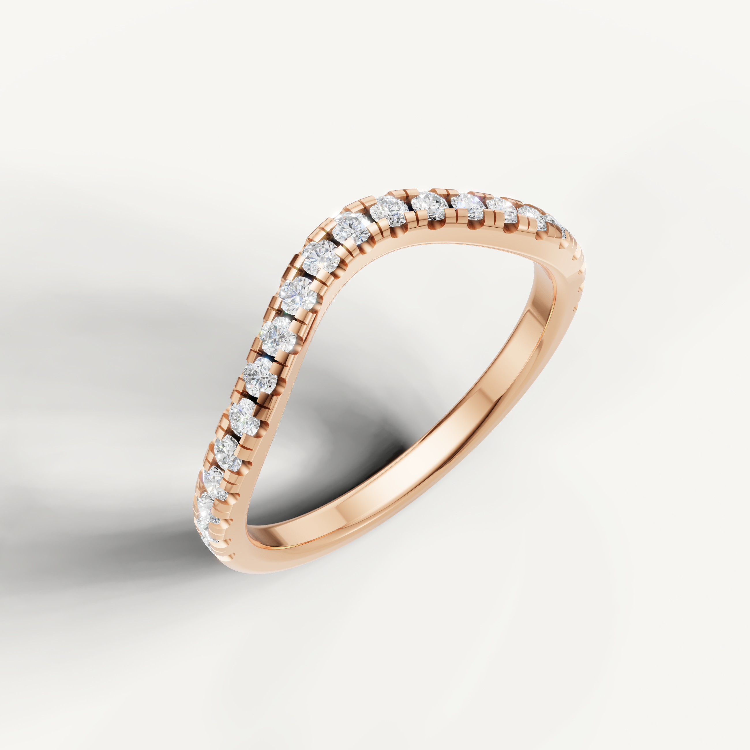 Elegant rose gold contoured wedding ring with round brilliant diamonds by Raul Diamonds