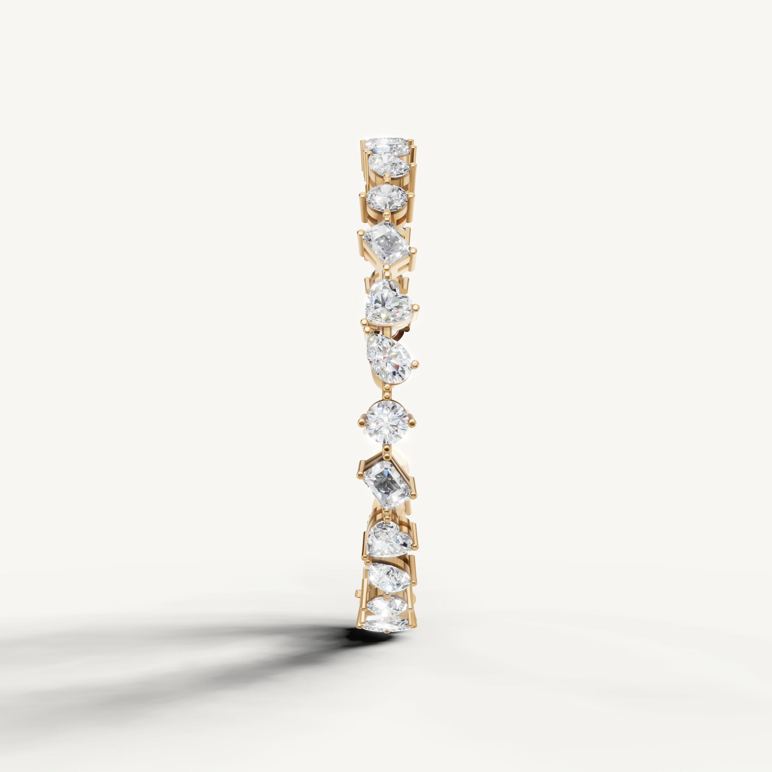 Elegant yellow gold diamond bracelet by Raul Diamonds featuring pear and round diamonds