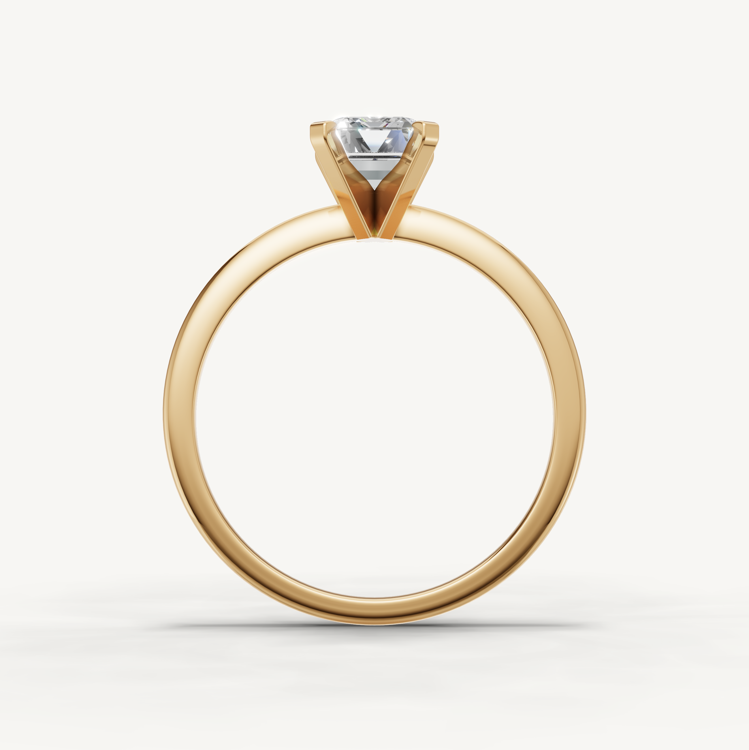 Classic emerald cut diamond ring in polished yellow gold by Raul Diamonds