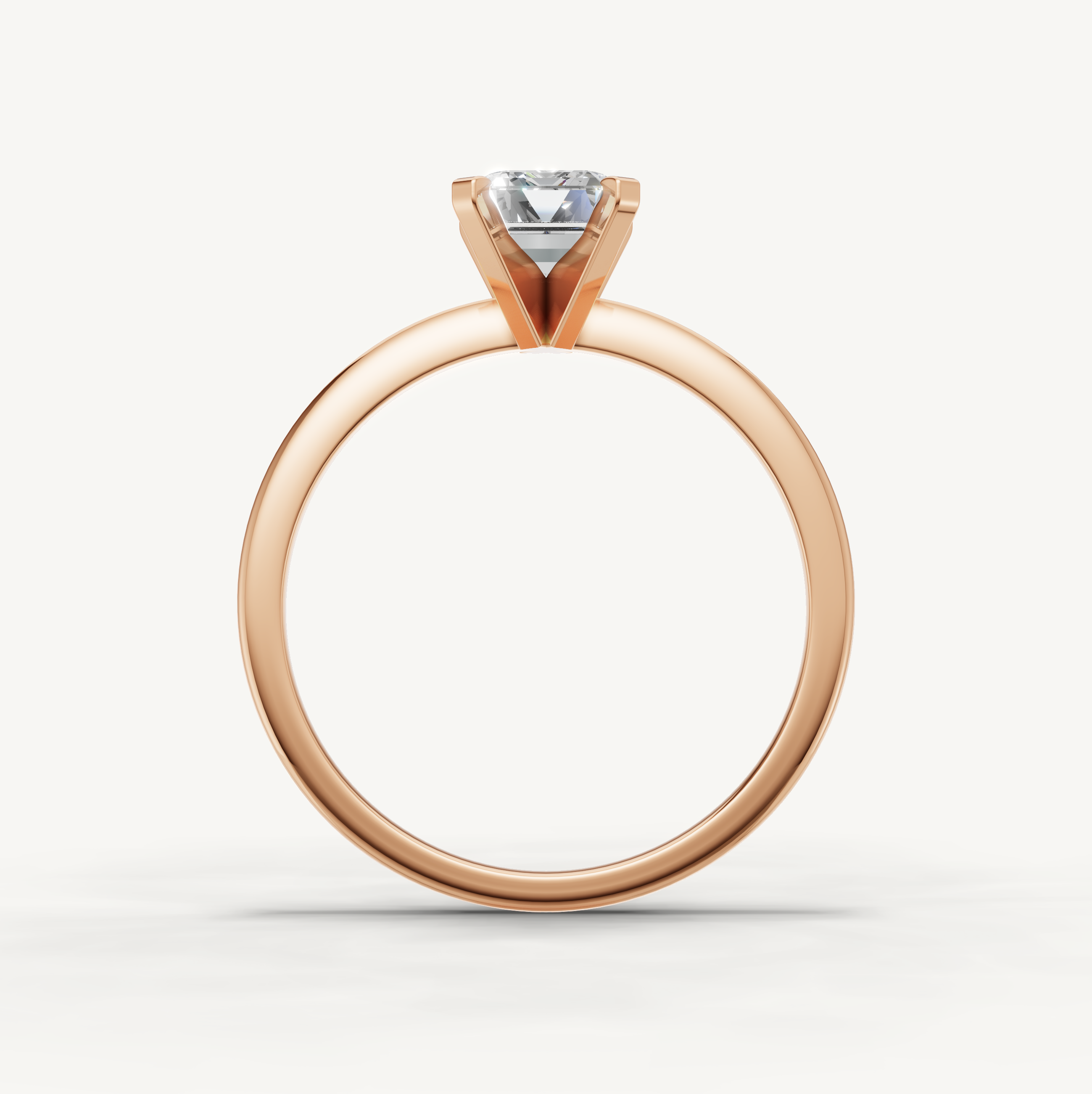 Luxury rose gold emerald cut diamond ring with elegant solitaire setting by Raul Diamonds