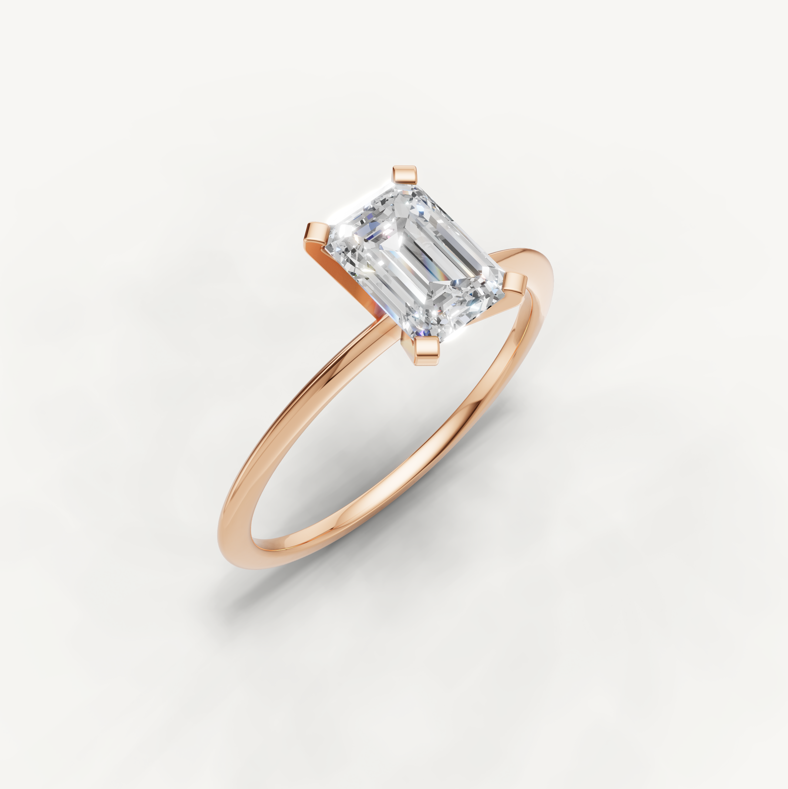 Romantic rose gold emerald diamond engagement ring for modern brides by Raul Diamonds