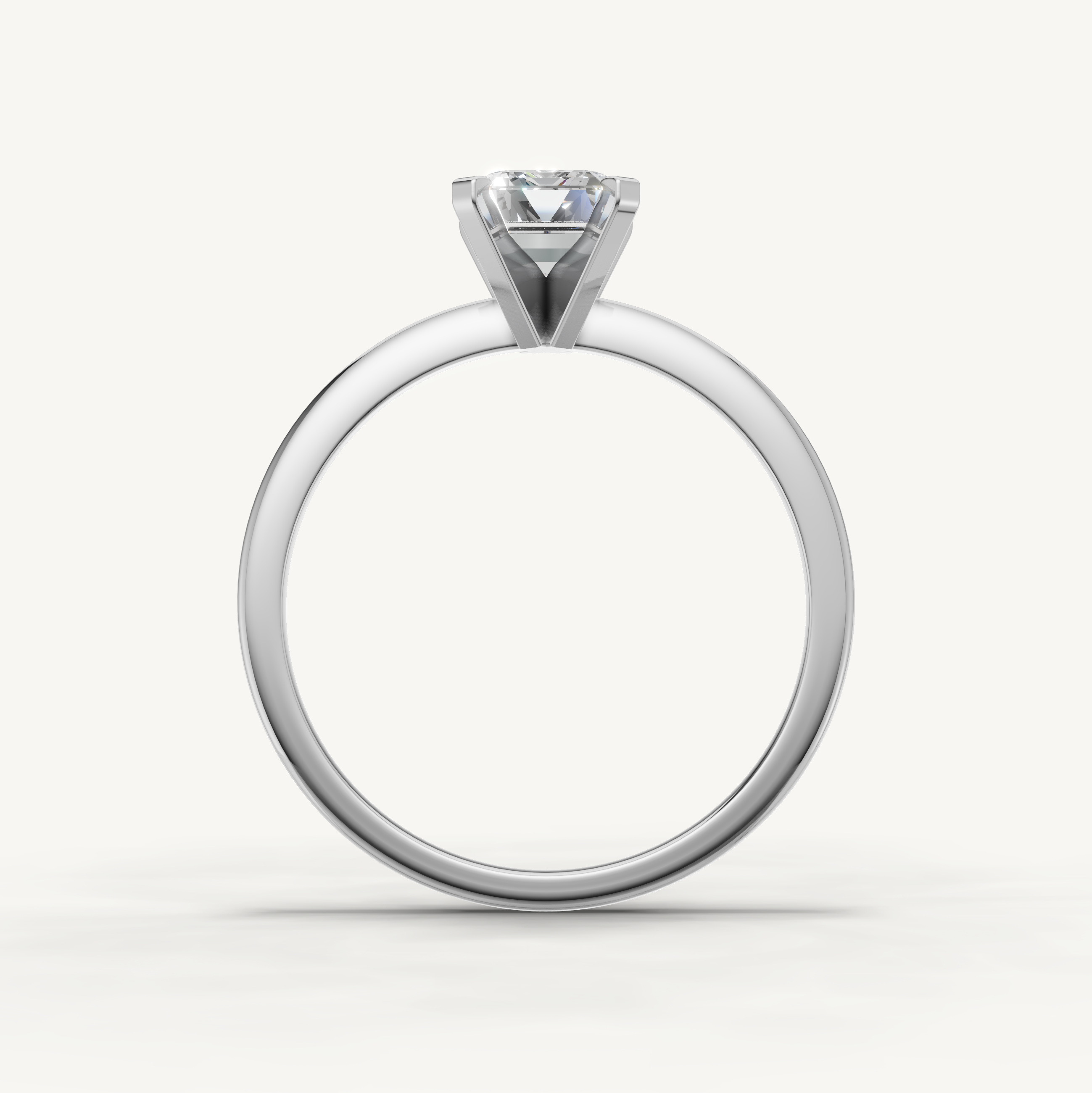 Elegant emerald cut diamond ring in white gold by Raul Diamonds