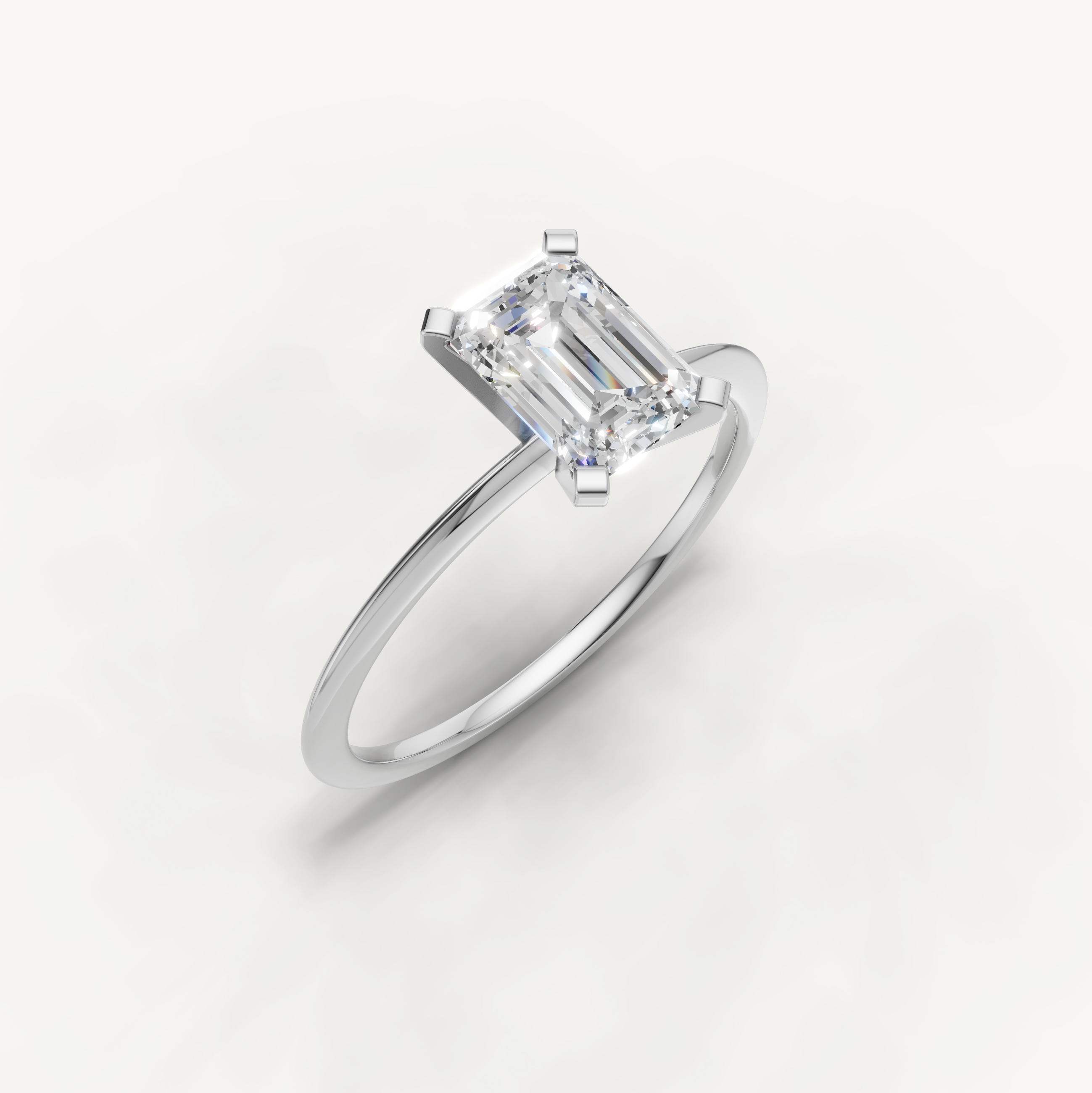 Timeless white gold emerald diamond engagement ring for women by Raul Diamonds