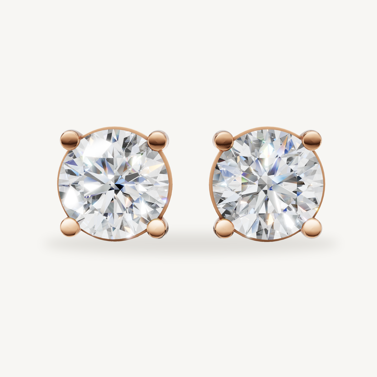 Raul Diamonds rose gold round diamond stud earrings with elegant solitaire brilliance