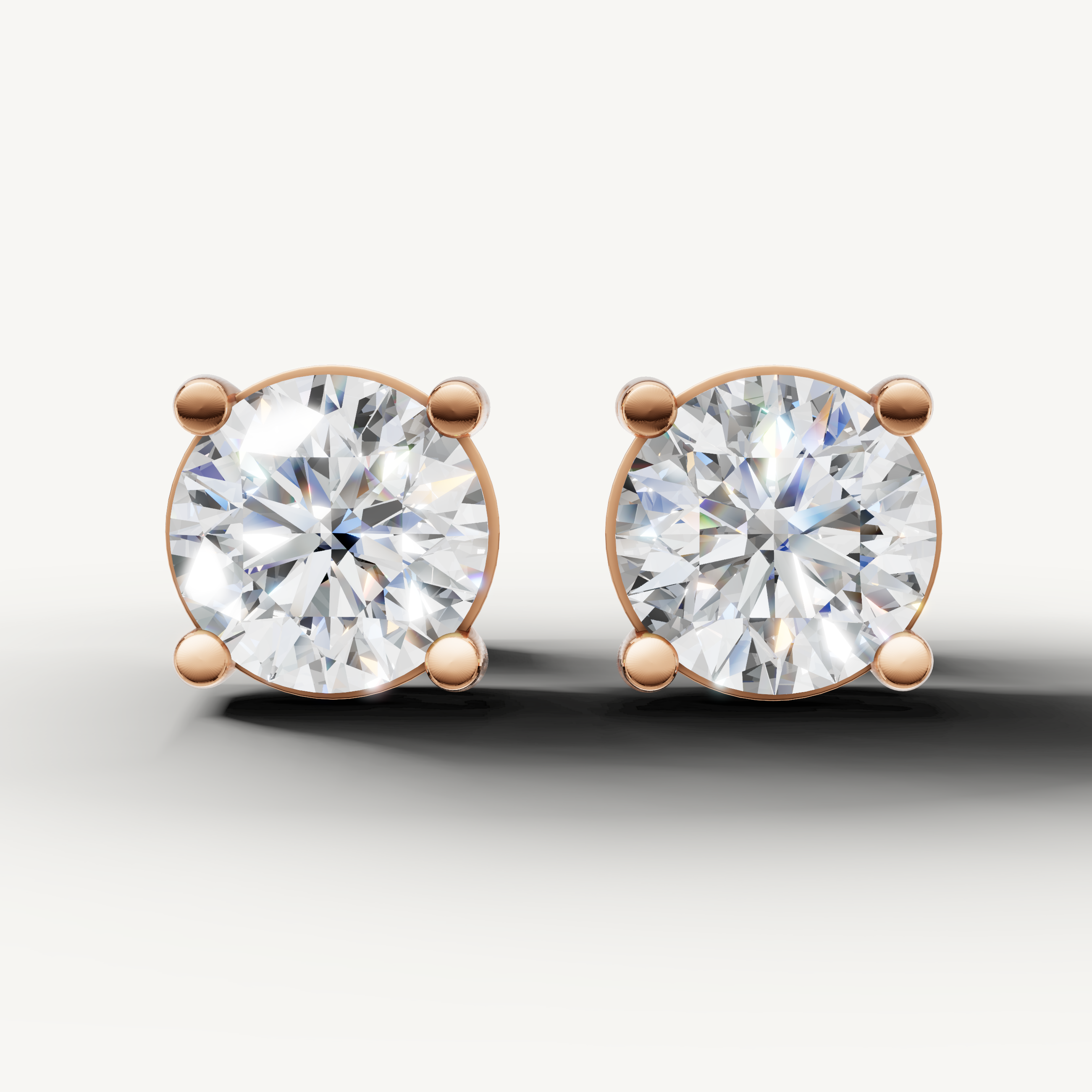 Raul Diamonds rose gold round diamond stud earrings with elegant solitaire brilliance