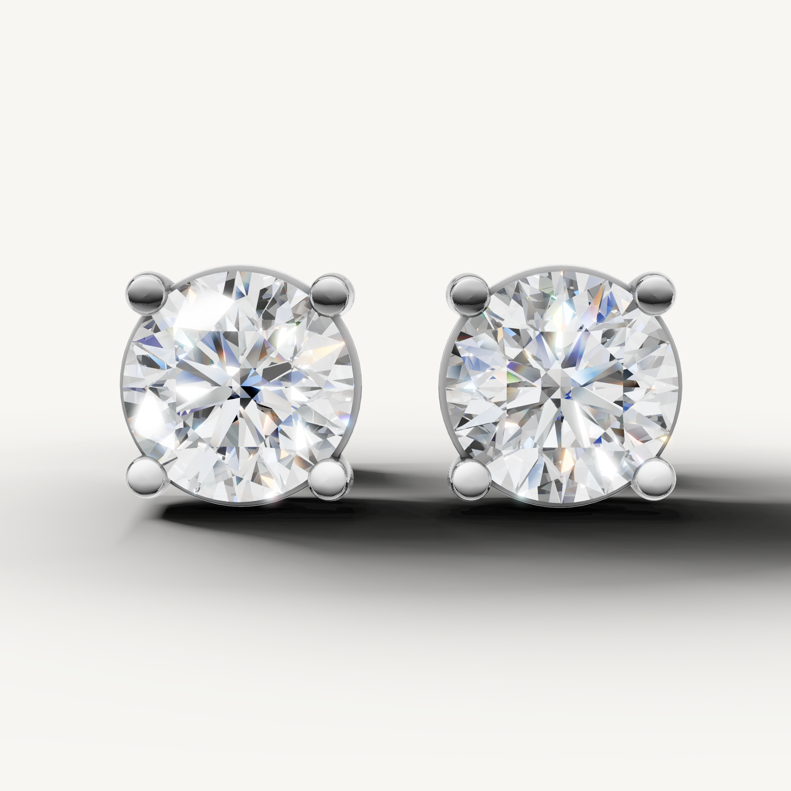 Raul Diamonds white gold round diamond stud earrings with classic solitaire sparkle
