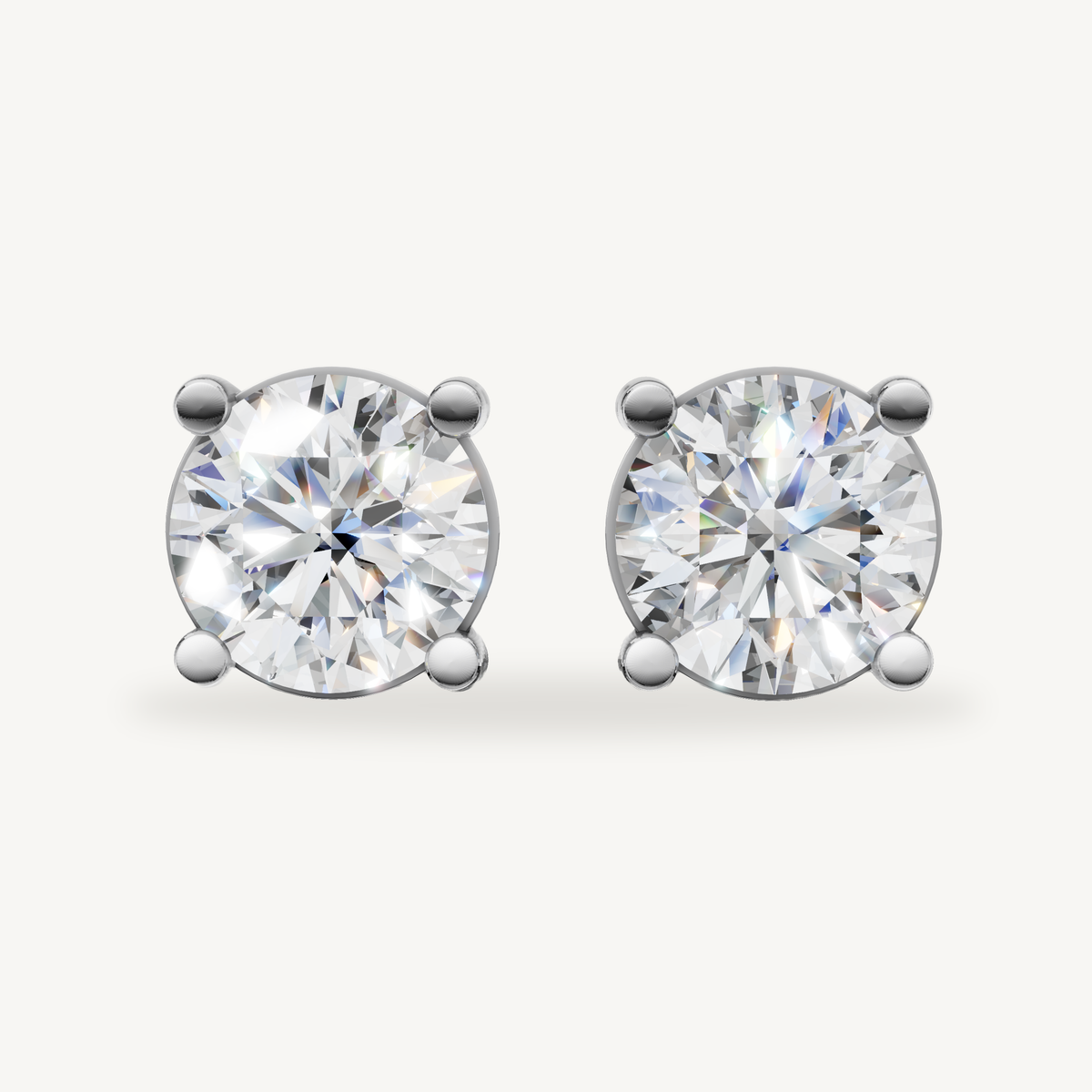 Raul Diamonds white gold round diamond stud earrings with classic solitaire sparkle