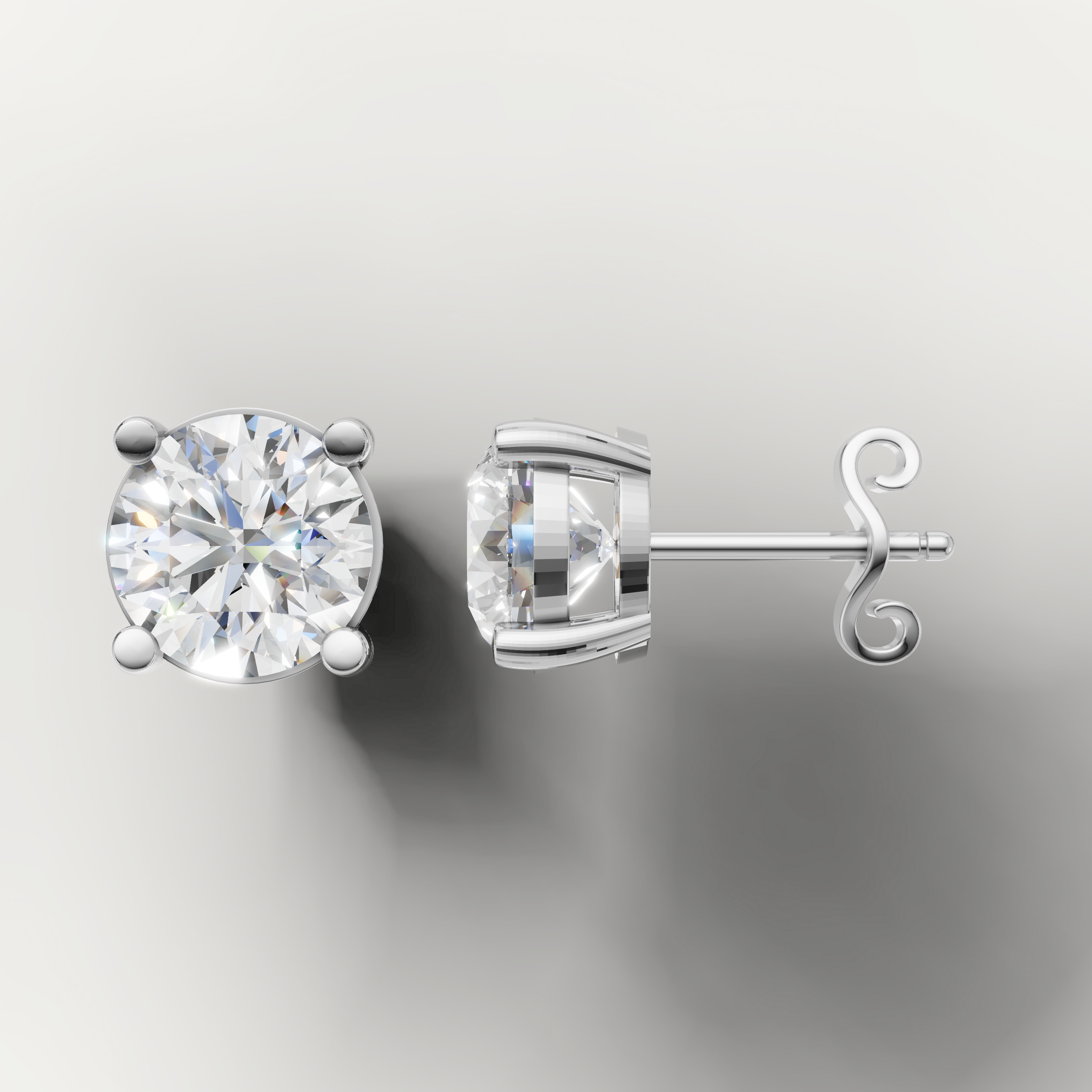 White gold round brilliant diamond stud earrings by Raul Diamonds featuring timeless fine jewelry elegance