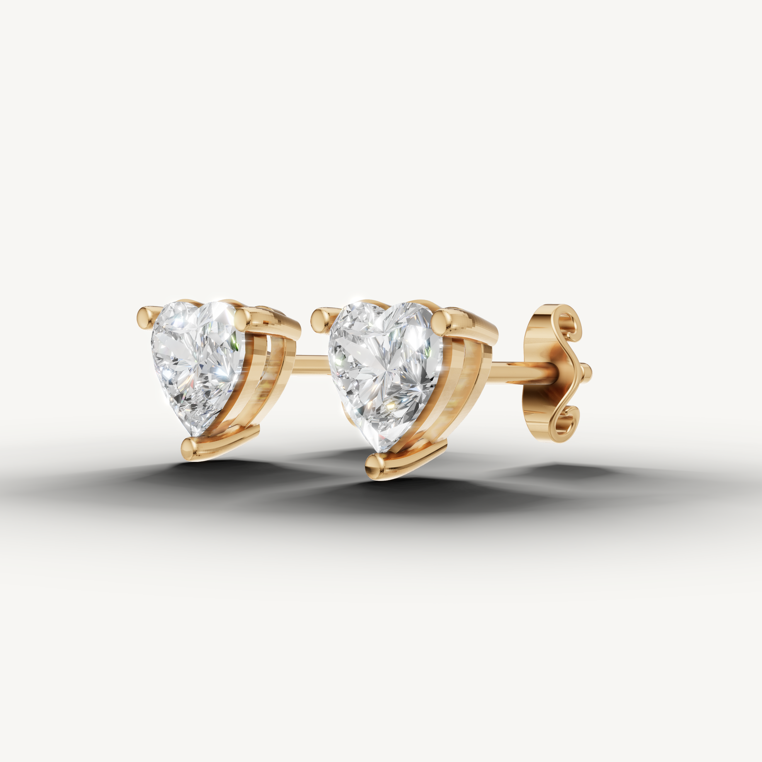 Raul Diamonds yellow gold solitaire heart diamond earrings with fine jewelry brilliance