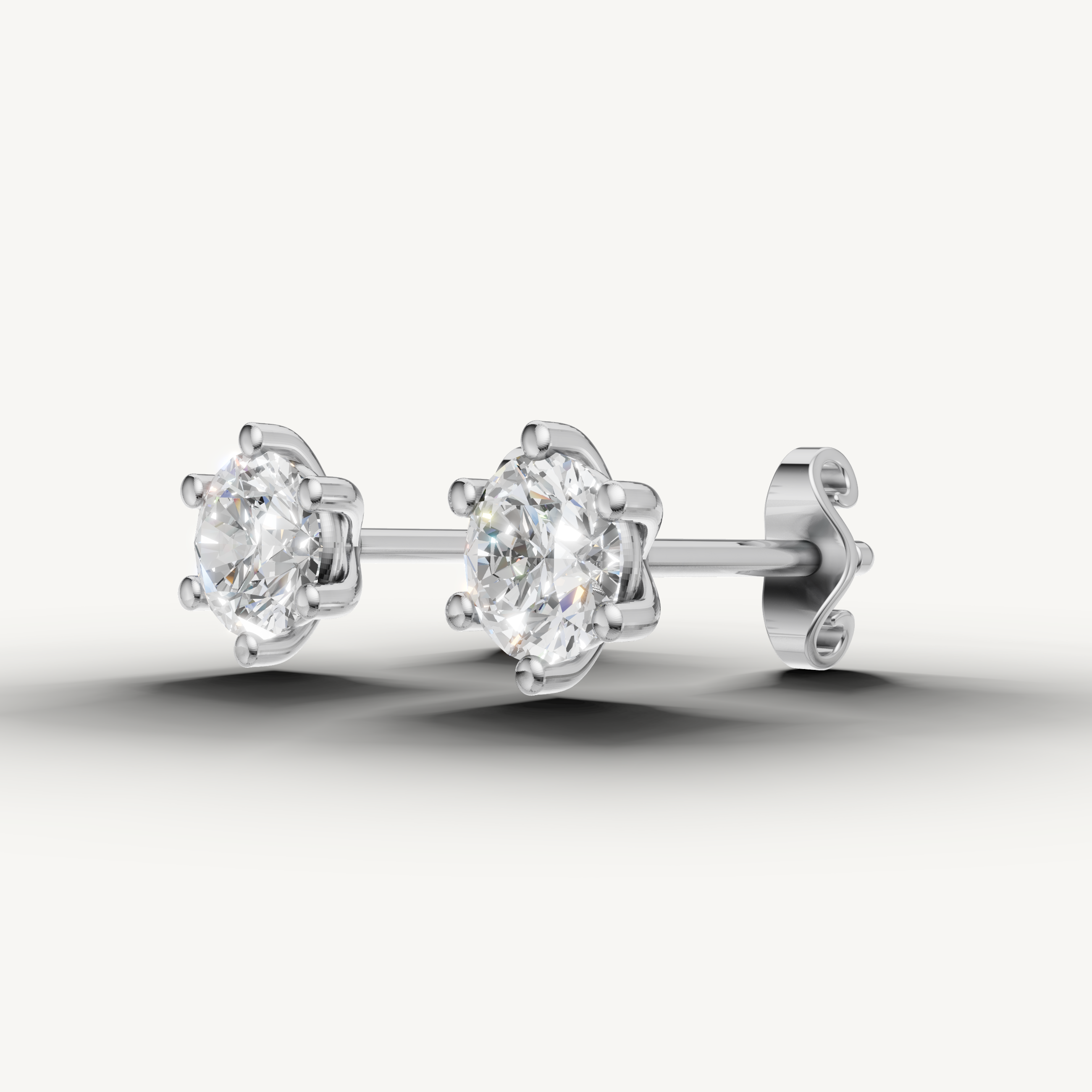 Raul Diamonds white gold six prong diamond stud earrings with sparkling solitaire diamonds