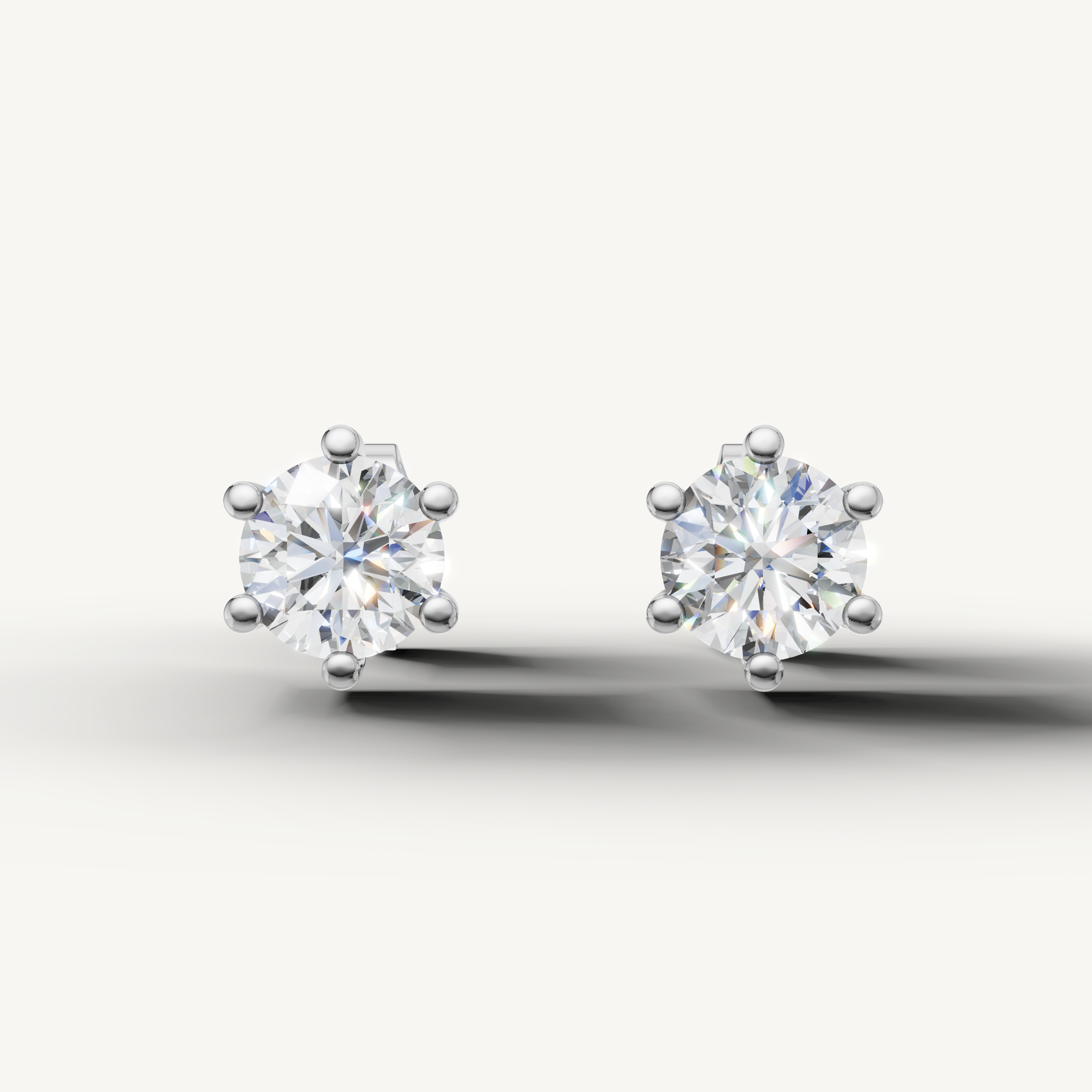 Raul Diamonds white gold round diamond stud earrings with brilliant six prong solitaire setting