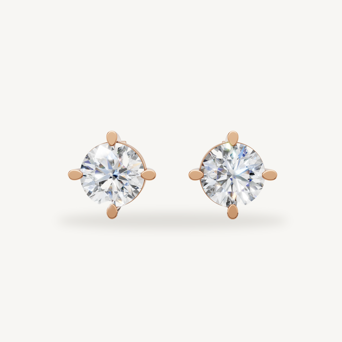 Raul Diamonds rose gold round diamond stud earrings with elegant solitaire diamond sparkle