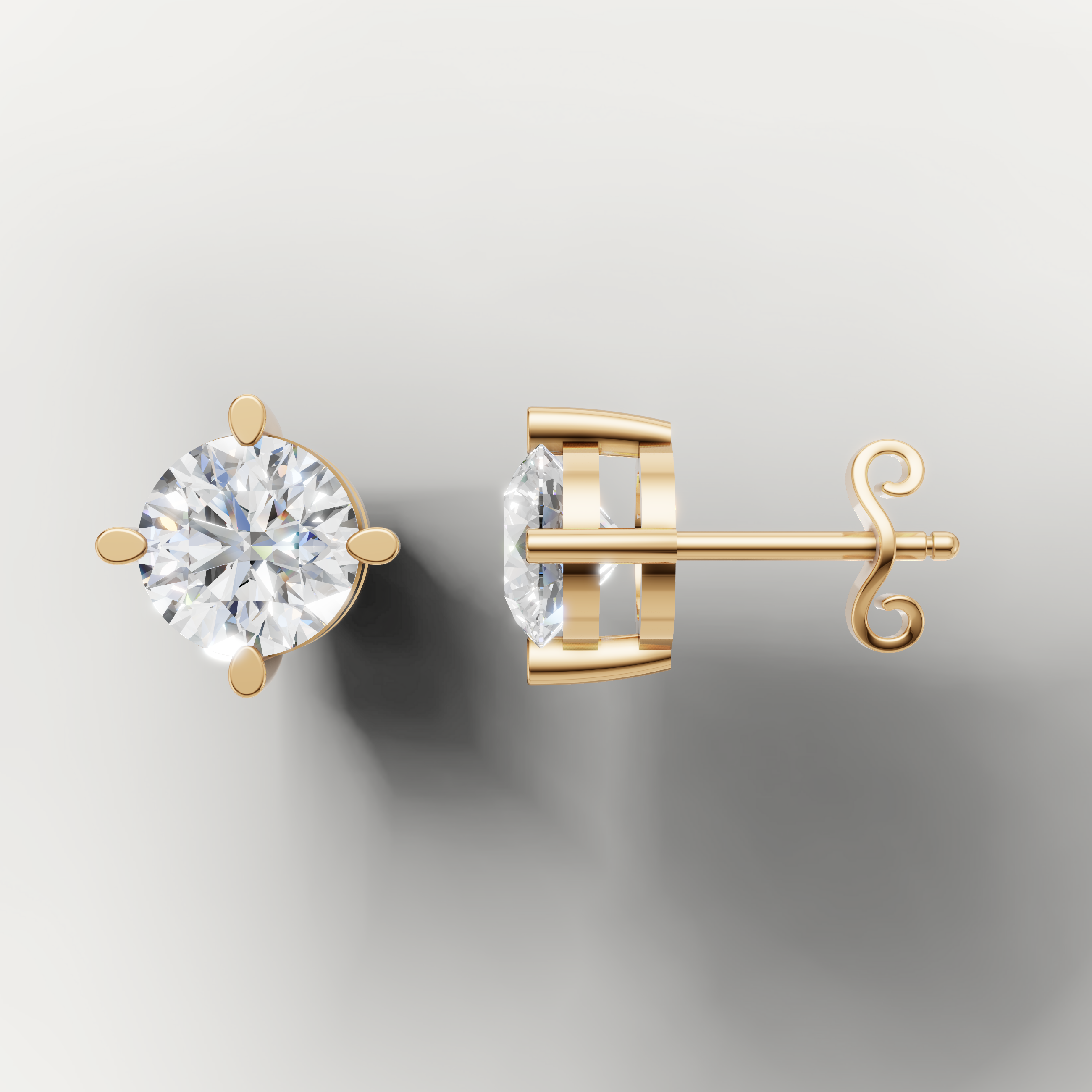 Yellow gold solitaire diamond stud earrings by Raul Diamonds featuring timeless brilliance and luxury