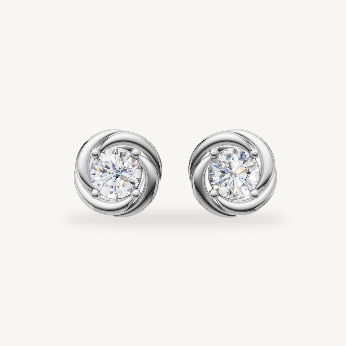 Raul Diamonds white gold swirl halo diamond stud earrings with brilliant round solitaire diamonds