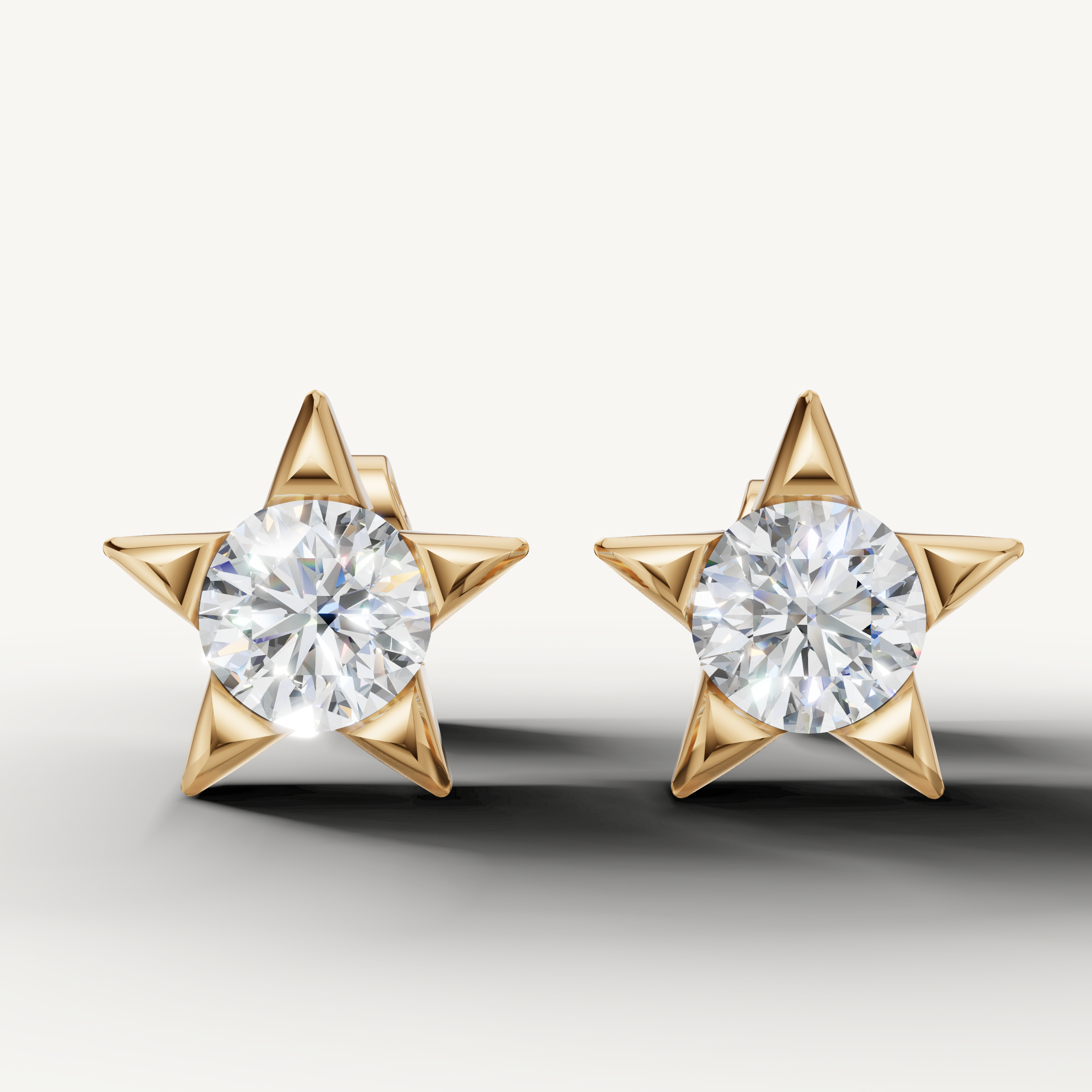 Star shaped lab grown diamond stud earrings in 14K yellow gold by Raul Diamonds