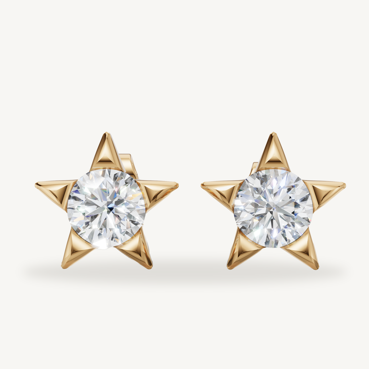 Star shaped lab grown diamond stud earrings in 14K yellow gold by Raul Diamonds