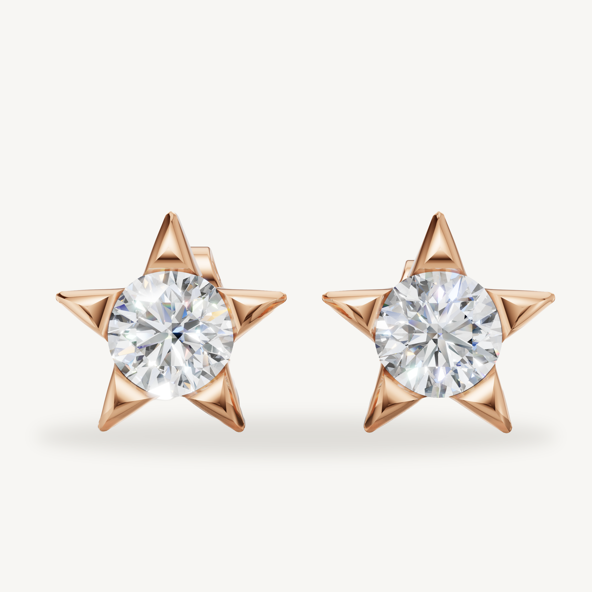 Star shaped lab grown diamond stud earrings in 14K rose gold by Raul Diamonds