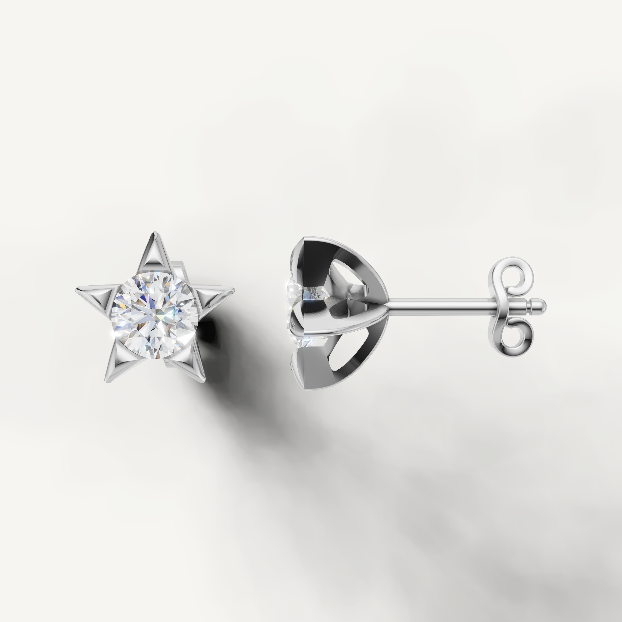 Luxury white gold star shaped diamond earrings with elegant sparkle by Raul Diamonds