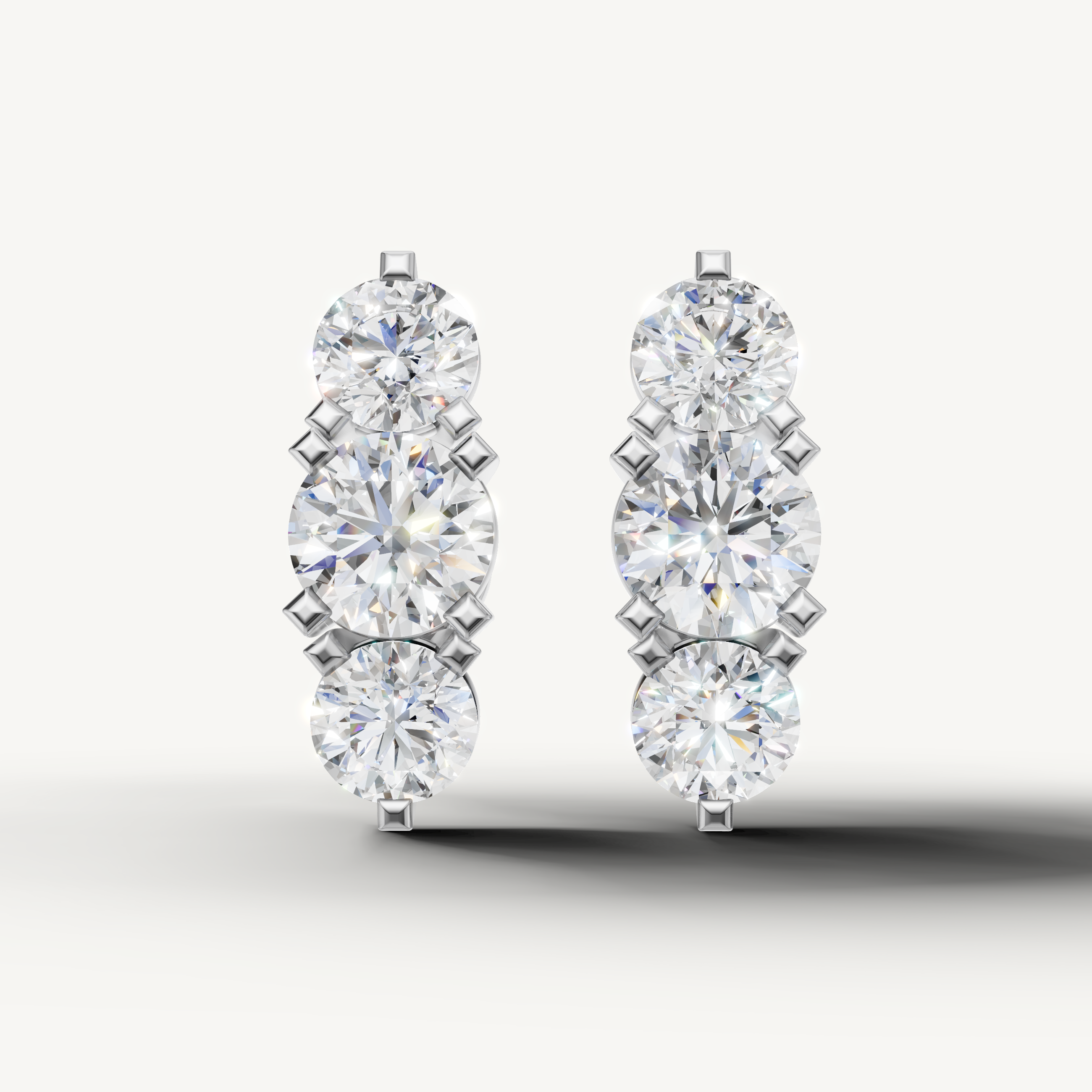 Raul Diamonds white gold round diamond drop earrings with sophisticated sparkle